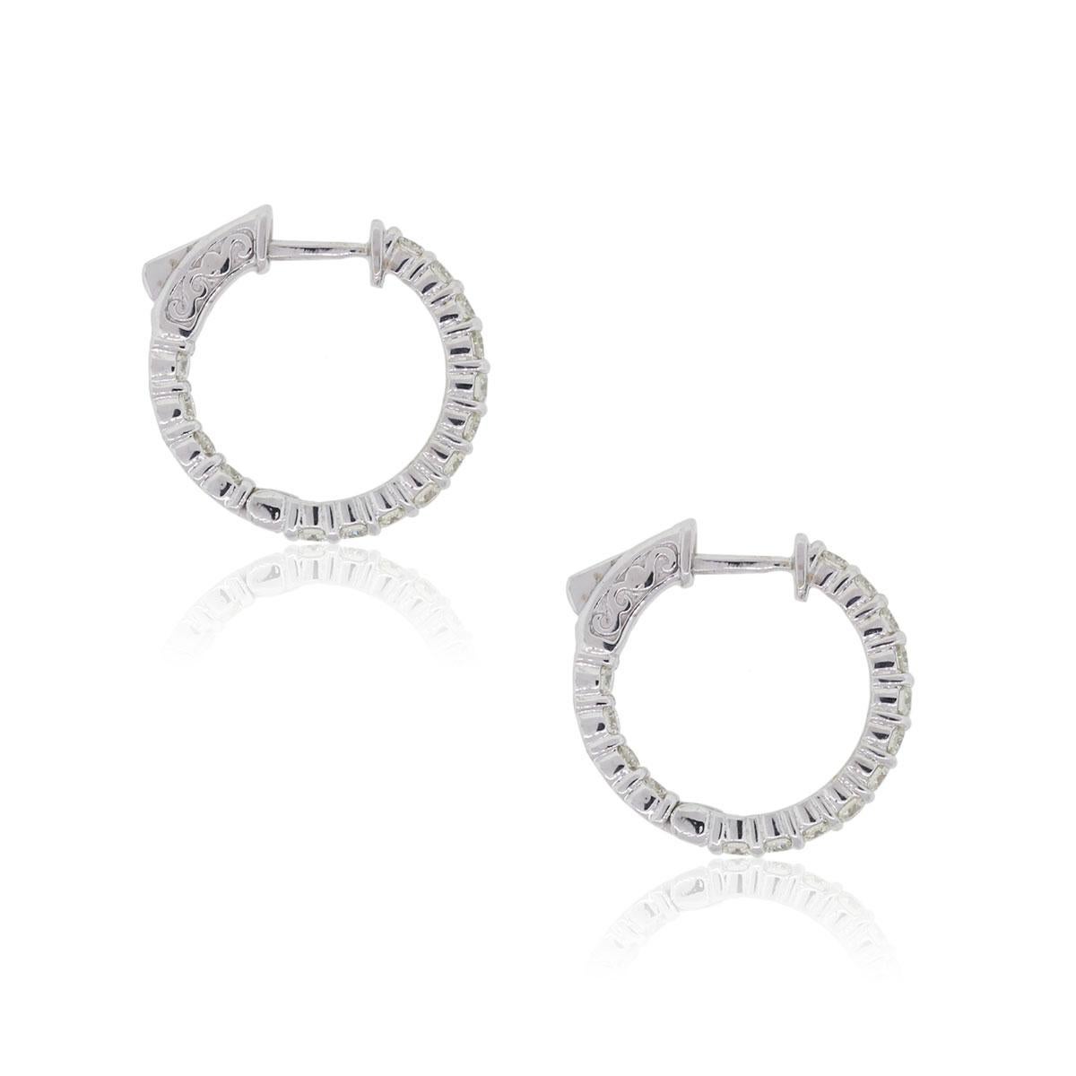 Material: 14k white gold
Diamond Details: Approximately 1.41ctw of round brilliant diamonds. Diamonds are G/H in color and VS in clarity.
Measurements: 0.81″ x 0.12″ x 0.79″
Earring Backs: Hinged Backs
Item Weight: 5.2g (3.4dwt)
Additional Details: