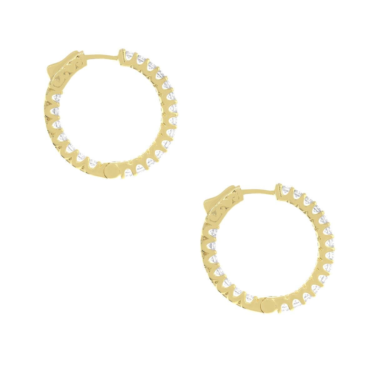 Material: 14k Yellow gold
Style: Diamond inside out hoop earrings
Diamond Details: 36 Stones, approximately 5.27ctw of round brilliant diamonds. Diamonds are G/H in color and VS in clarity.
Earring Measurements: 1.25″ x 0.20″ x 1.30
Total Weight: