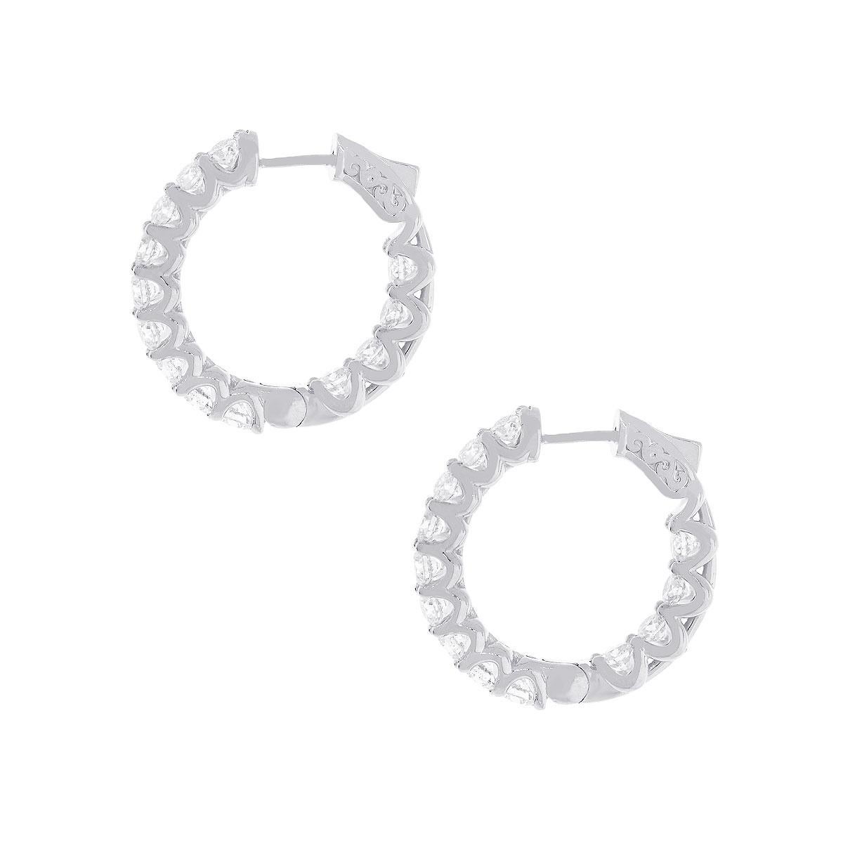 Material: 14k White Gold
Style: Diamond inside out hoop earrings
Diamond Details: 24 Stones, approximately 0.99ctw of round brilliant diamonds. Diamonds are G/H in color and VS in clarity.
Earring Measurements: 0.75″ x 0.20″ x 0.80″
Total Weight: