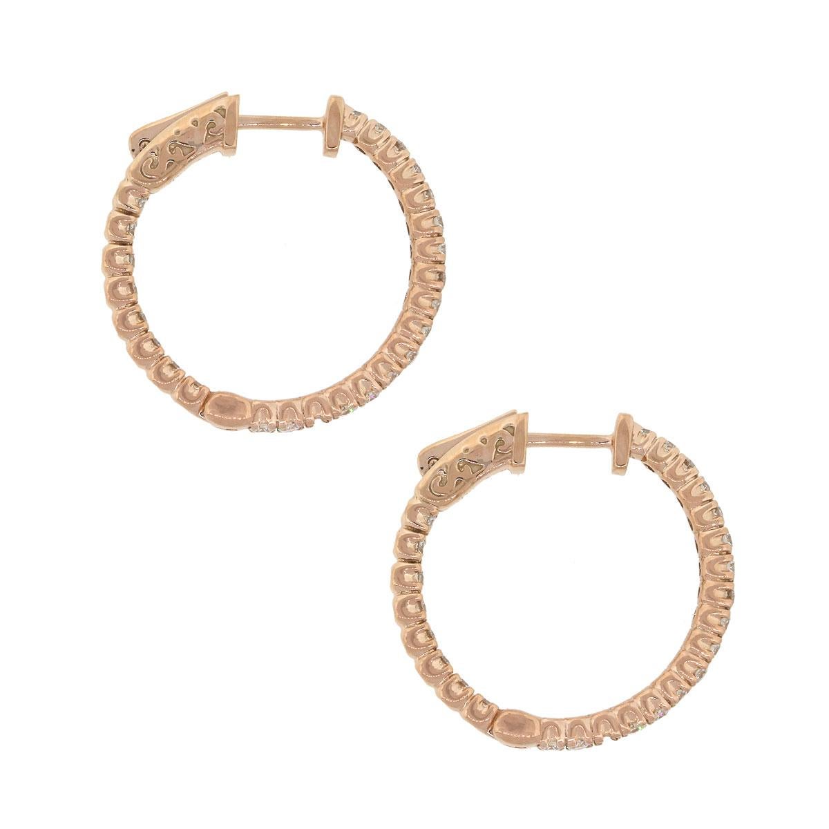 Material: 14k Rose Gold
Style: Diamond Inside Out Hoops
Diamond Details: Approximately 1.19ctw of round brilliant diamonds. Diamonds are G/H in color and SI in clarity.
Earring Measurements: 0.95″ x 0.11″ x 0.95″
Total Weight: 6.3g (4.1dwt)
Earring