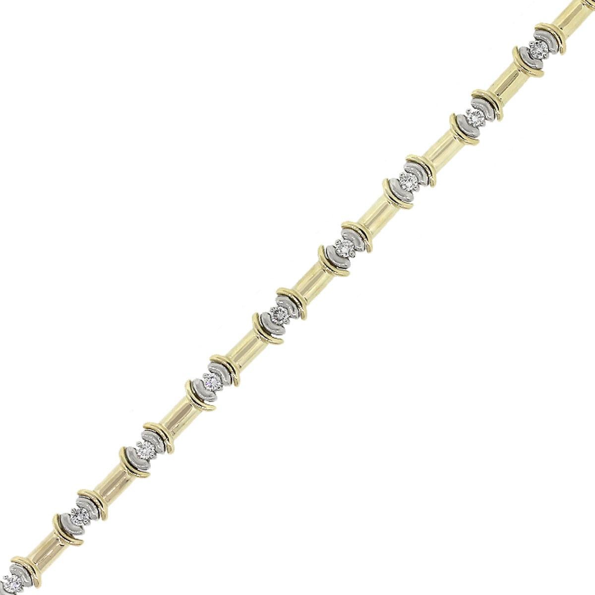 Material: 14k Two Tone
Diamond Details: Approximately 1ctw of round shape diamonds. Diamonds are G/H in color and VS in clarity
Clasp: Tongue in box clasp with safety latch
Measurements: Will fit a 7″ wrist
Total Weight: 18.4g (11.9dwt)
SKU: G8338