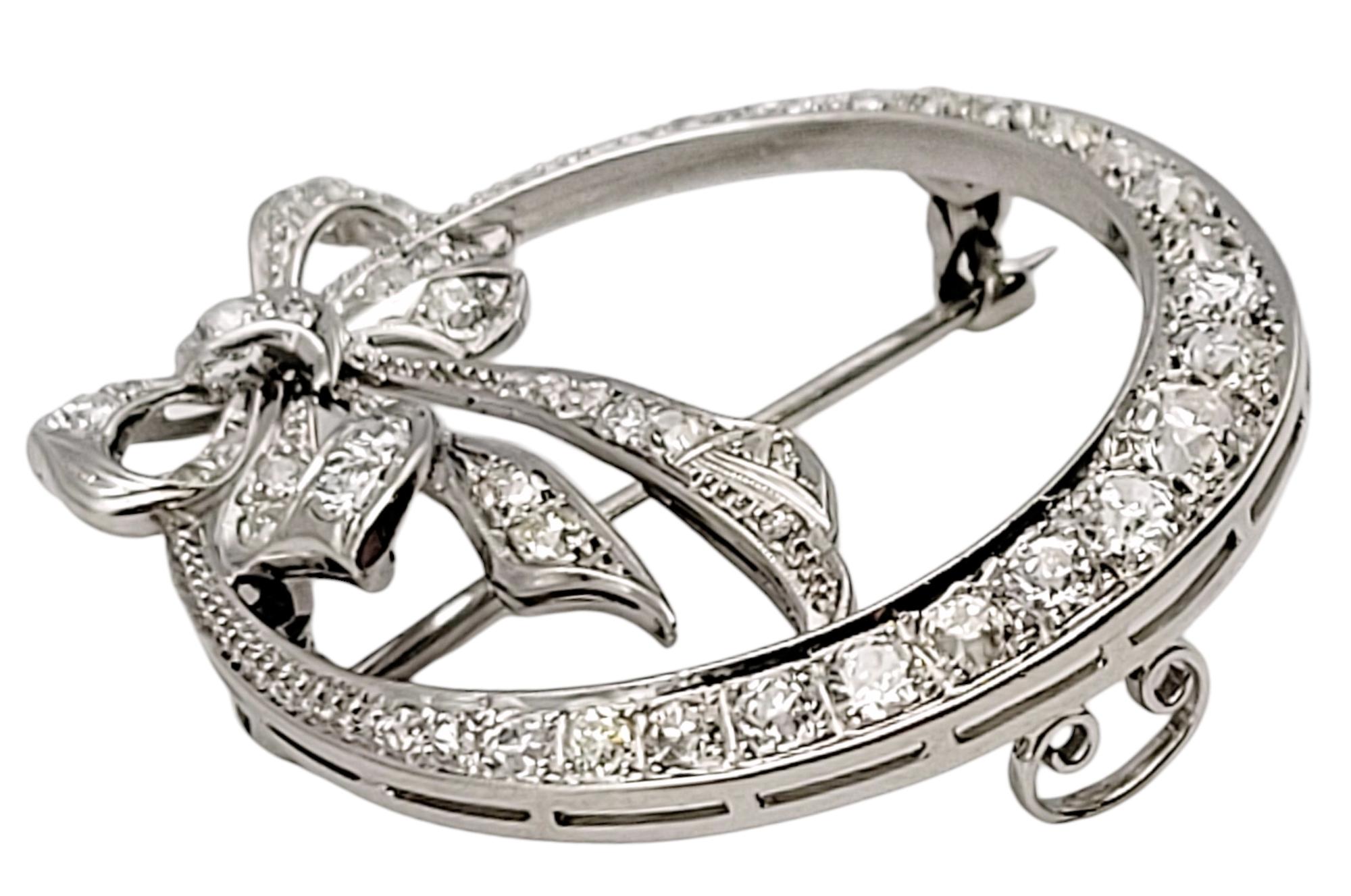 Art Deco Round Diamond Open Circle Brooch with Bow Detail in Polished Platinum