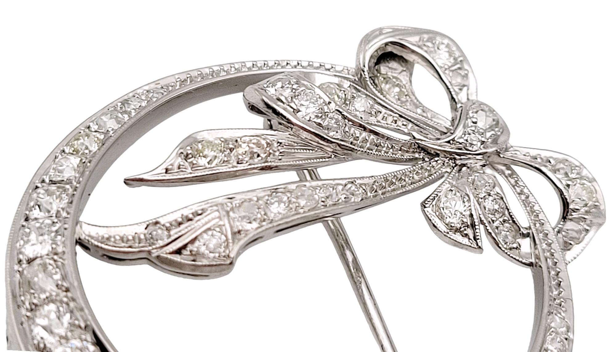 Round Diamond Open Circle Brooch with Bow Detail in Polished Platinum 1