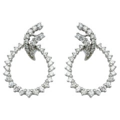 Orecchini a clip con diamante rotondo e cerchio aperto in oro bianco 14 carati lucido