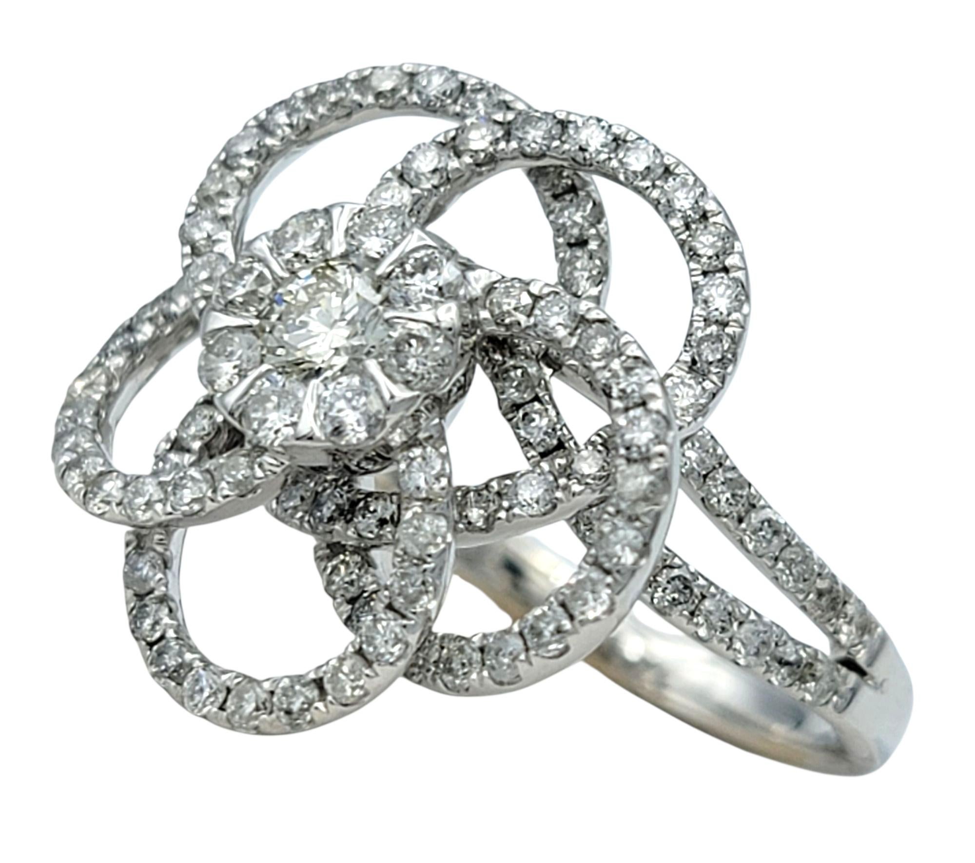 Round Cut Round Diamond Pavé Flower Motif Cocktail Ring in Polished 14 Karat White Gold For Sale