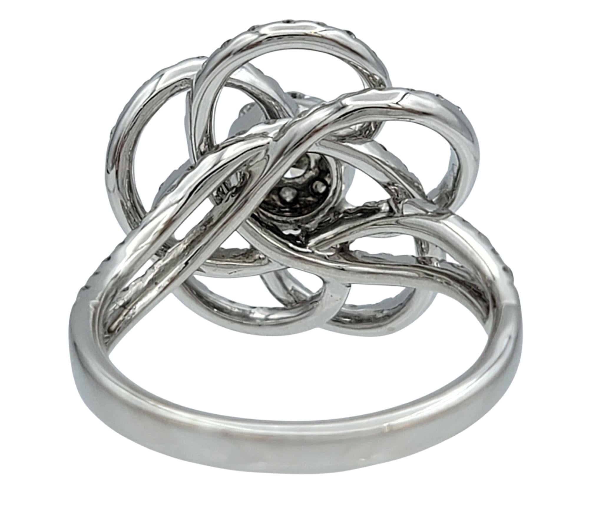 Round Diamond Pavé Flower Motif Cocktail Ring in Polished 14 Karat White Gold For Sale 1