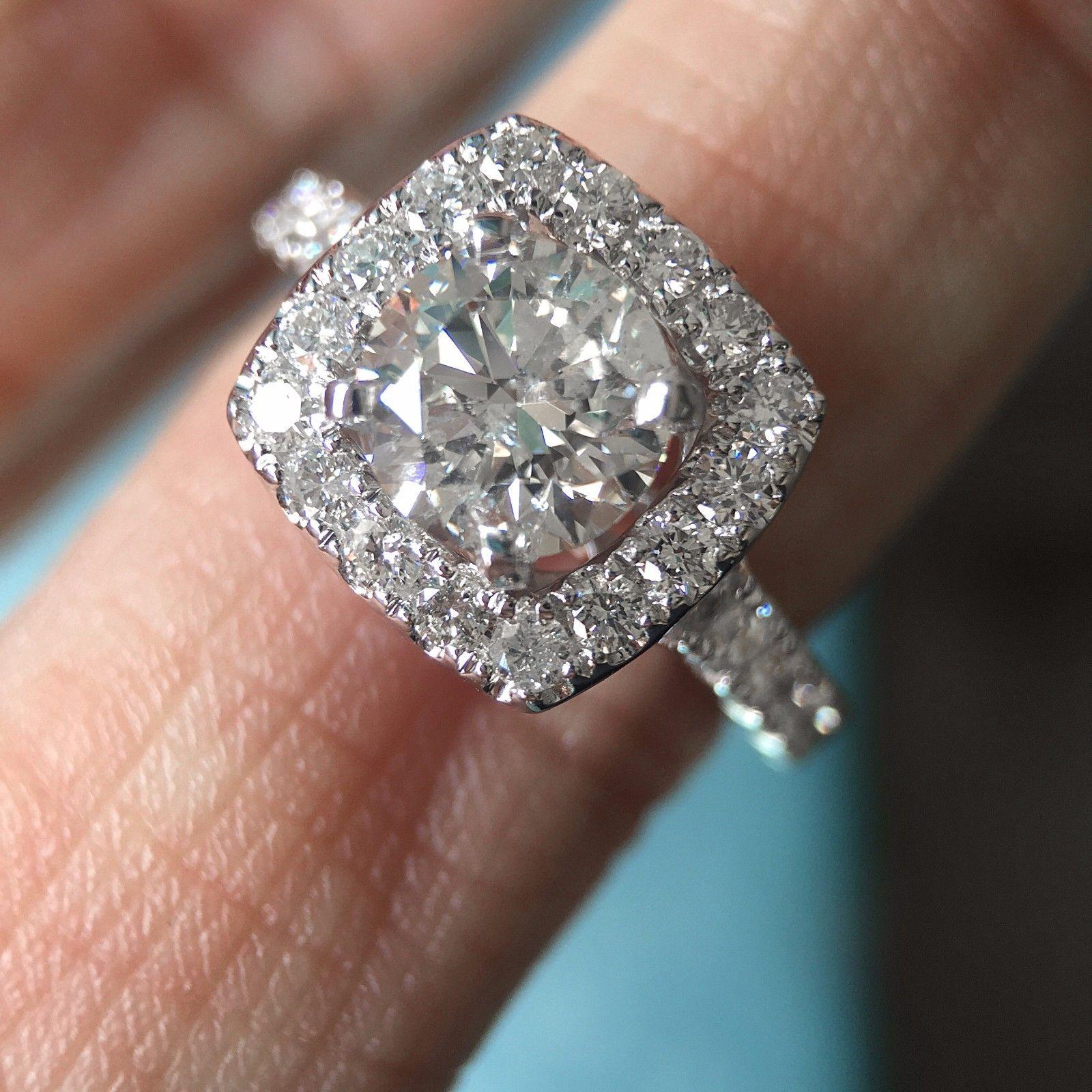 Round Diamond Pave Halo Engagement Ring White Gold - 1.35 Carat TW 
Can Be made with your diamond or any other diamond, price will be adjusted based on center stone.
Ring will be made to order and take approx 3-6 business weeks.

Center Stone