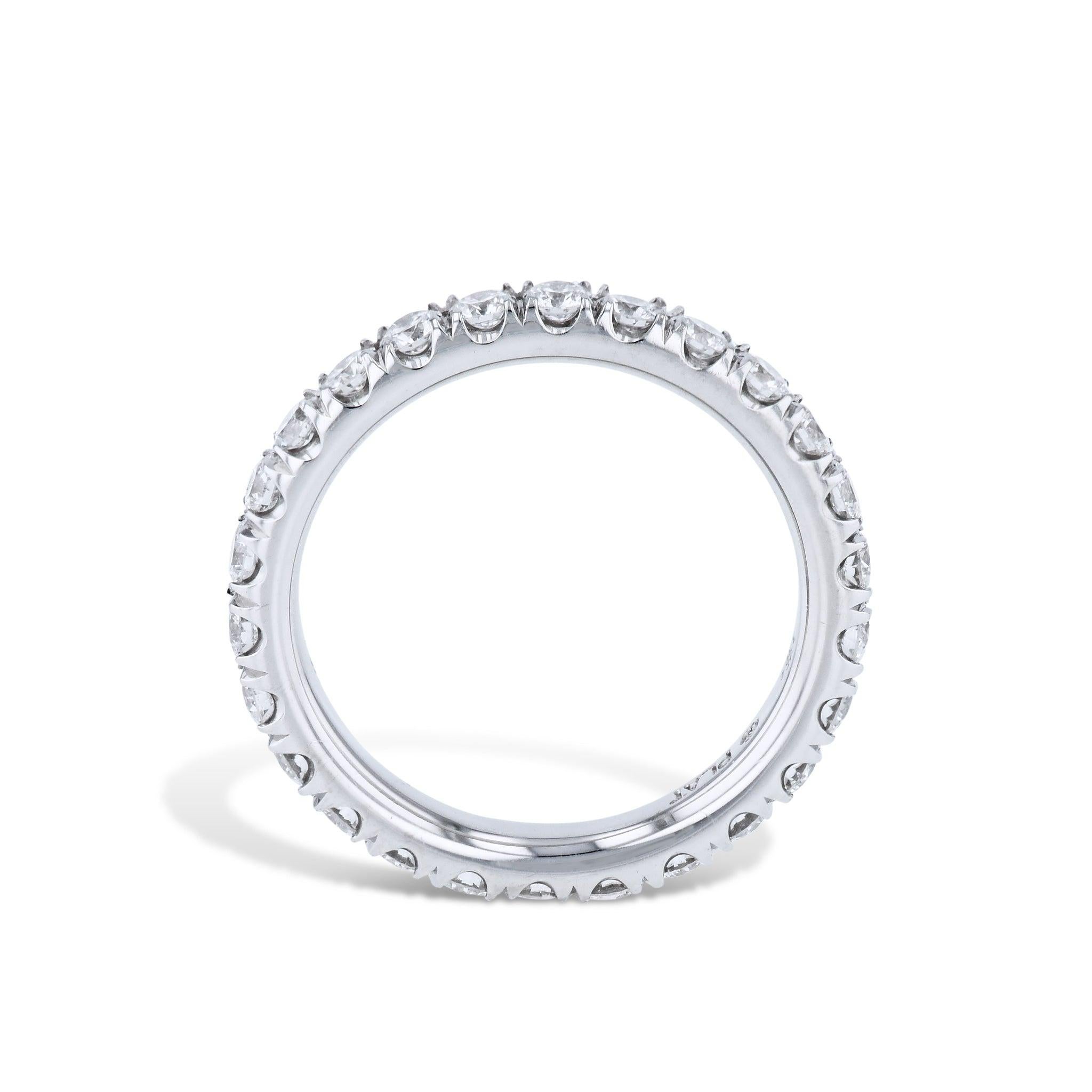 The Round Diamond Platinum Eternity Band Ring is a stunning must-have. Crafted with 27 brilliant cut diamonds, this gorgeous eternity band sparkles and shimmers. The 3mm U-Set diamonds create a mesmerizing effect that will draw all eyes. Expertly