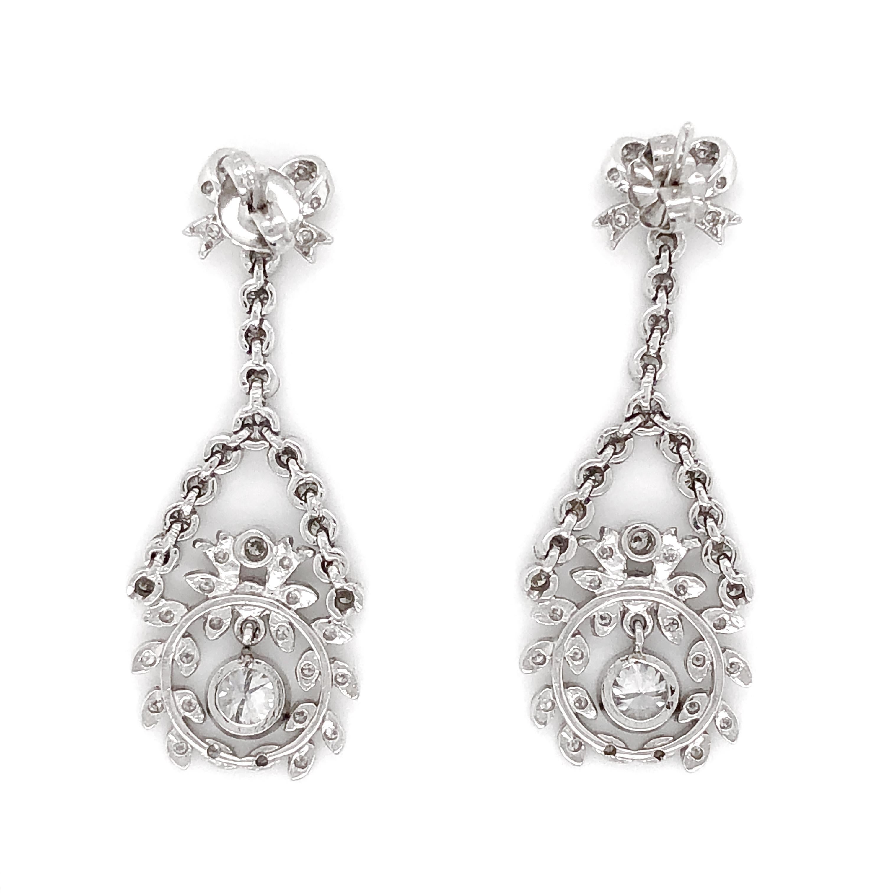 Contemporary Round Diamond Ribbon Floral Motif Dangling 2.61 Carat Platinum Earrings For Sale