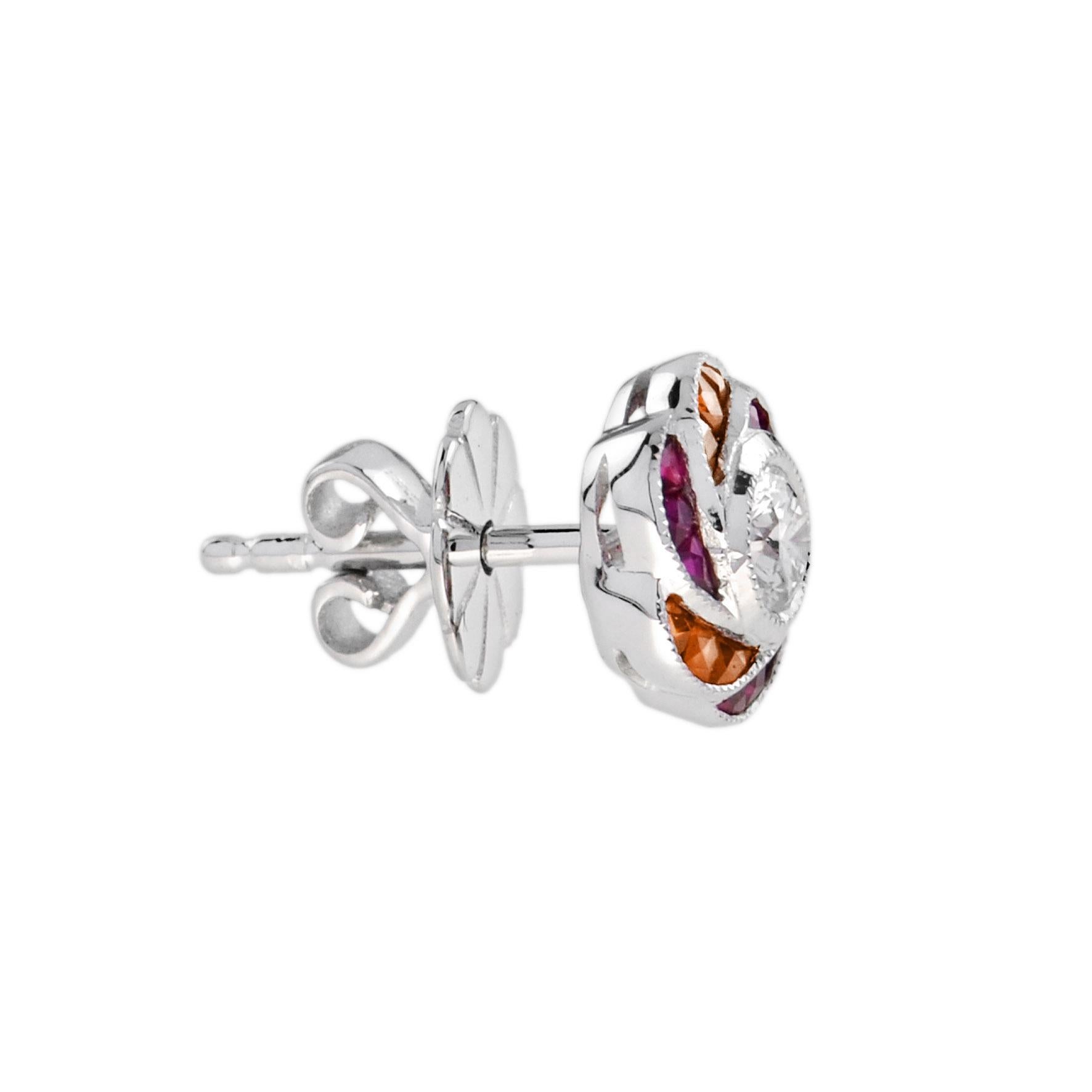 Perfect with everyday wear, these charming vintage Art Deco revivalist design stud earrings feature a pair of brilliant cut diamonds surrounded by ruby and vivid orange sapphire for rose petals finished look all in 18K white