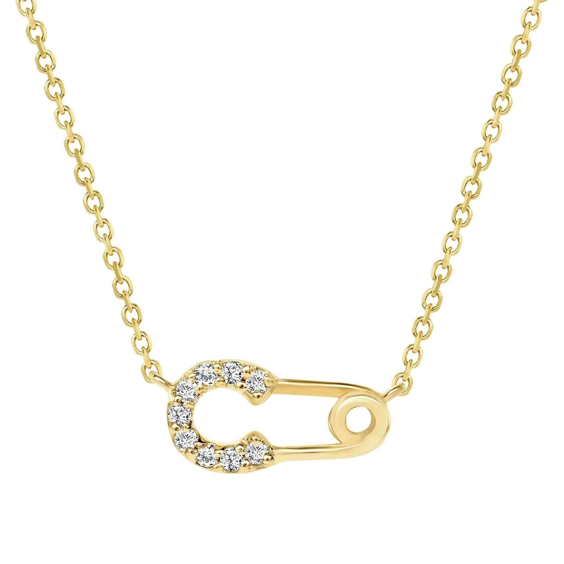 A beautiful Diamond Safety Pin Pendant Necklace adorned by small natural Round Cut Diamonds in Pave Setting. A thoughtful gift for Anniversary, Birthday, Graduation, Valentine's, and Holidays for someone you love.

Gold : 14k Gold
Diamond Carats :