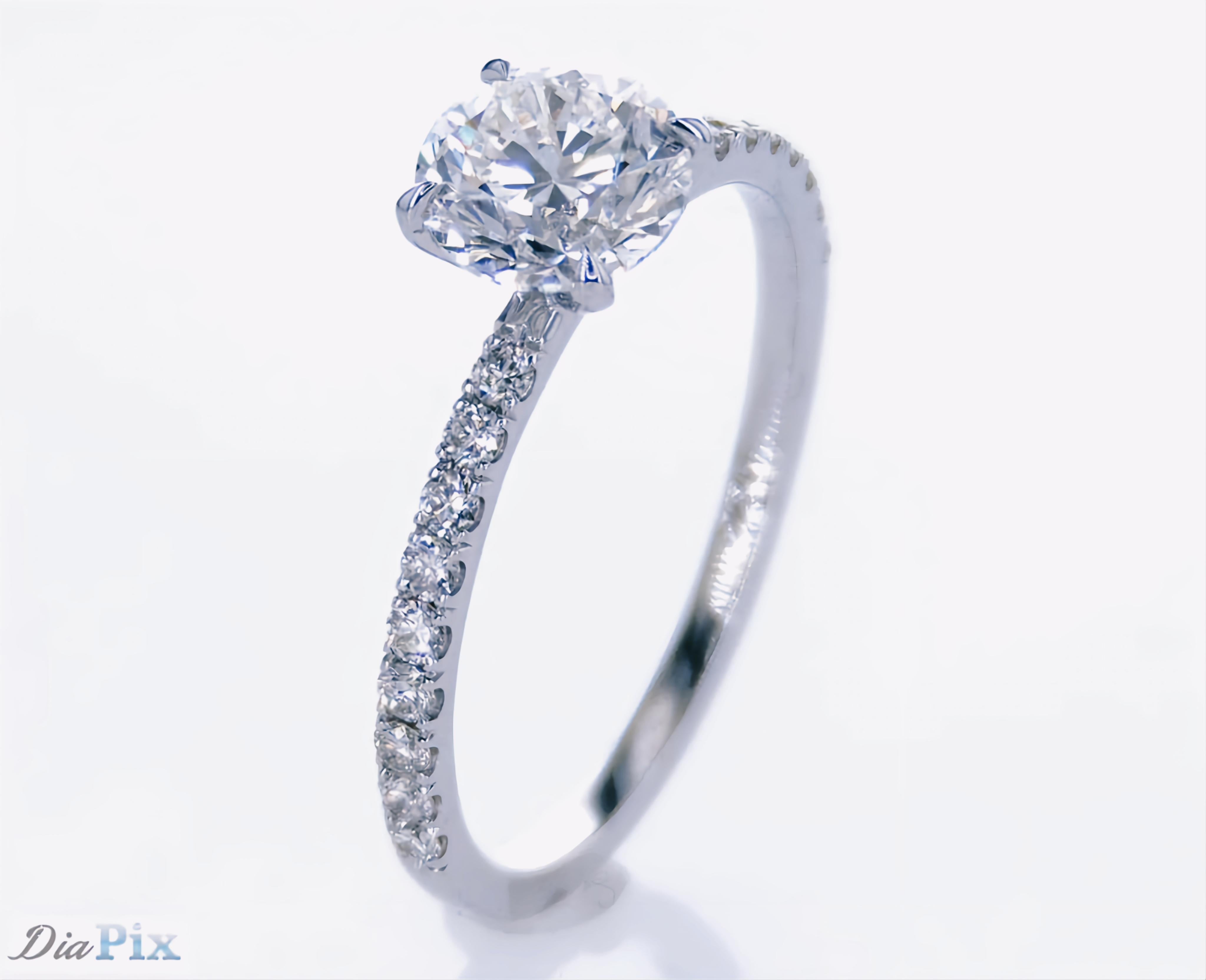 Modern Round Diamond Solitaire Engagement Ring For Sale
