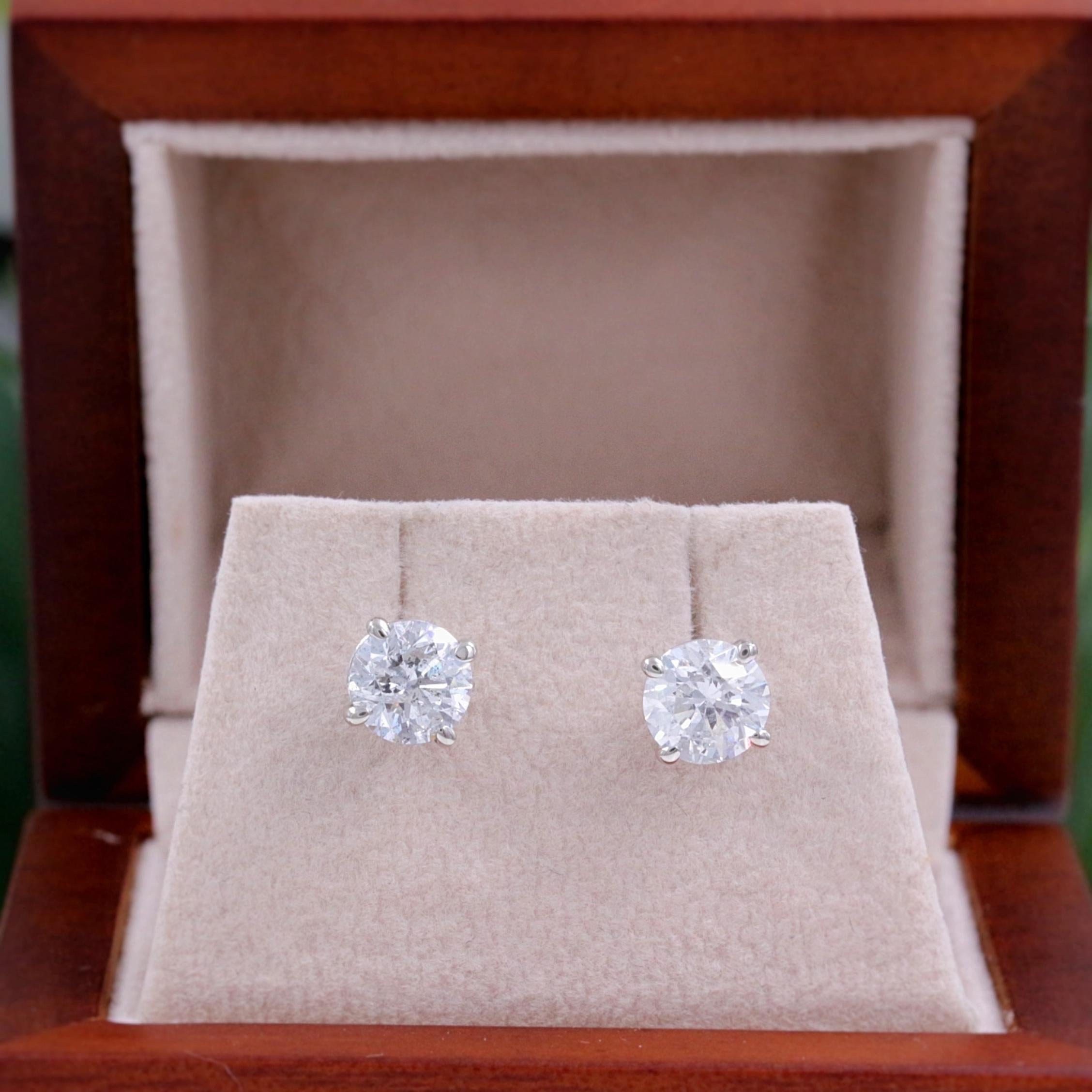 Round Diamond Solitaire Stud Earrings 2.00 Carat Set in 14 Karat White Gold 6