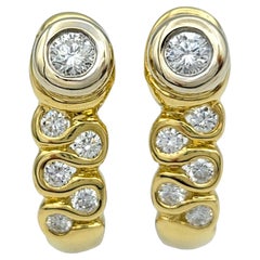 Bezel Set Diamond Squiggle Motif Drop Earrings in Two-Tone 18 Karat Gold