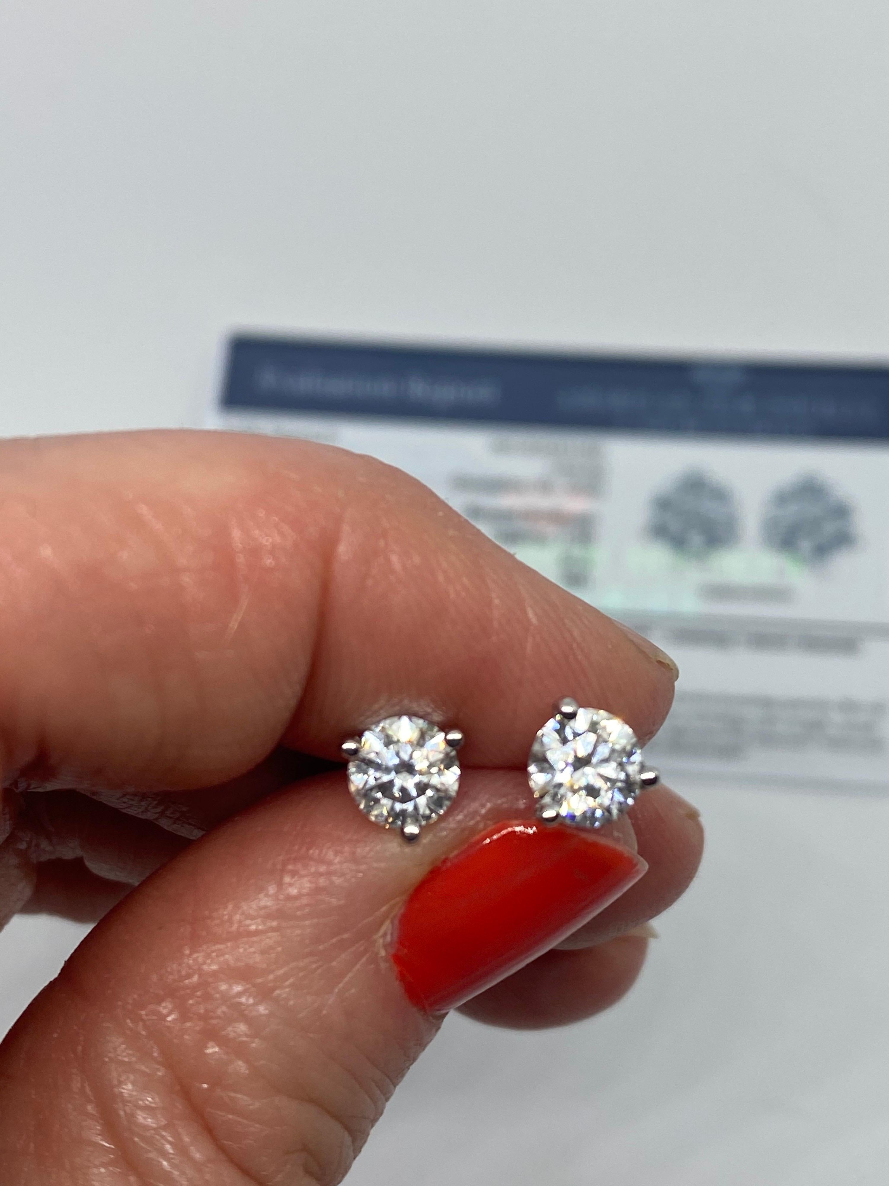 Contemporary AGS Certified 1.46ctw F/E Color SI1 Round Diamond Studs in 14kt WG