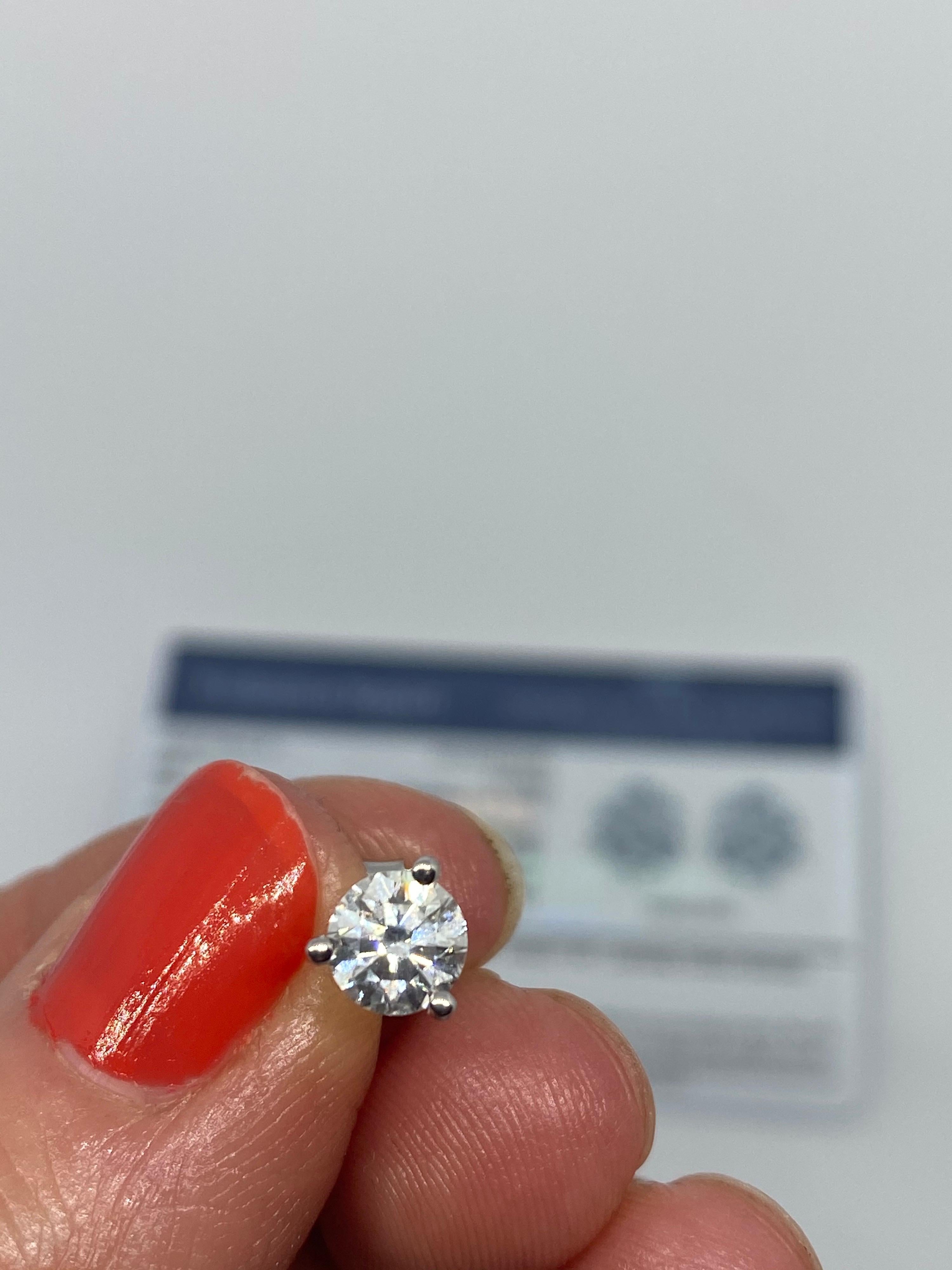 AGS Certified 1.46ctw F/E Color SI1 Round Diamond Studs in 14kt WG In New Condition In New York, NY