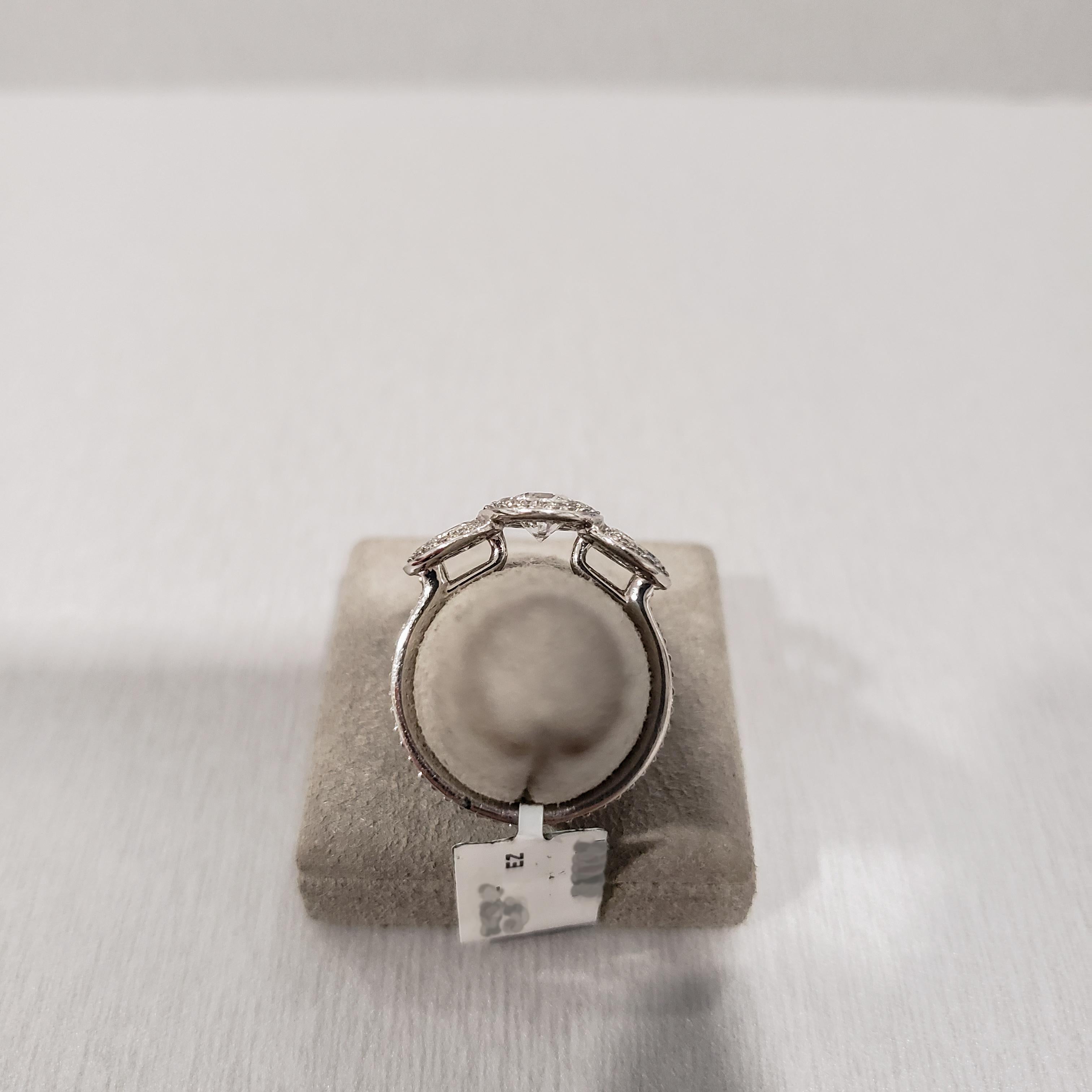 Round Cut Round Diamond Three-Stone Halo Engagement Ring