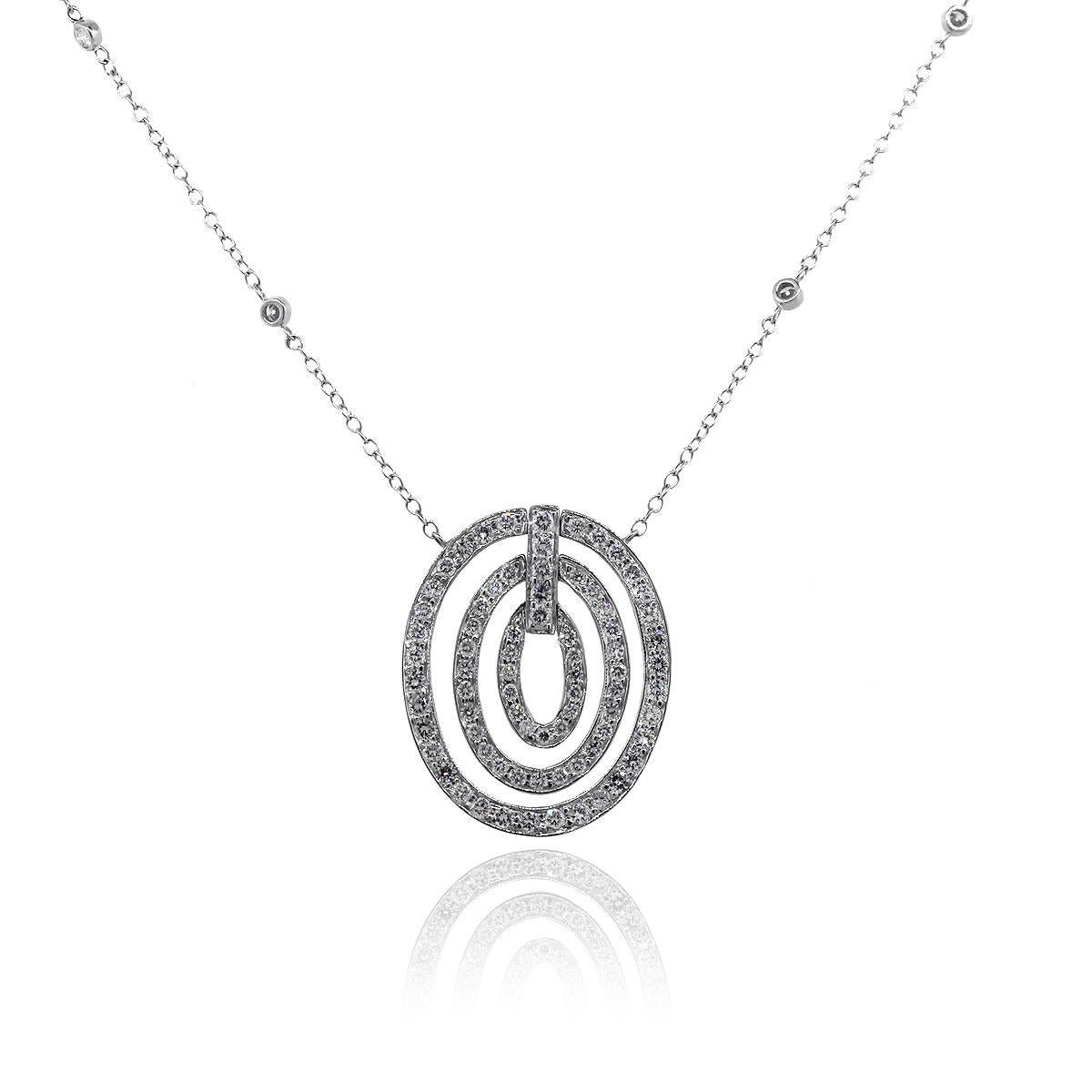 Material: 18k White Gold
Diamond Details: Approx. 3.11ctw of round brilliant diamonds. Diamonds are G/H in color and VS in clarity.
Measurements : Necklace measures 17″ Pendant measures approx. 0.90″ x 1.20″ x 0.12″
Fastening: Lobster clasp
Item