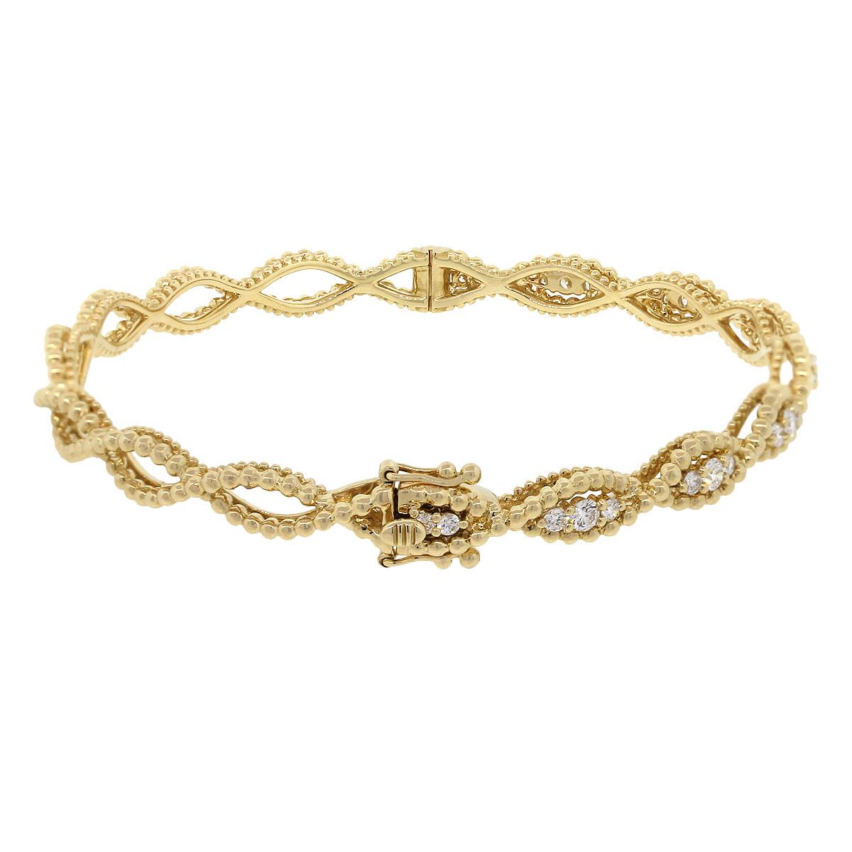 Material: 14k Yellow Gold
Diamond Details: Approximately 0.95ctw of round brilliant diamonds. Diamonds are G/H in color and VS in clarity
Total Weight: 13g (8.3dwt)
Bracelet Measurements: 6.5″ inside circumference
Clasp Details: Box in tongue with
