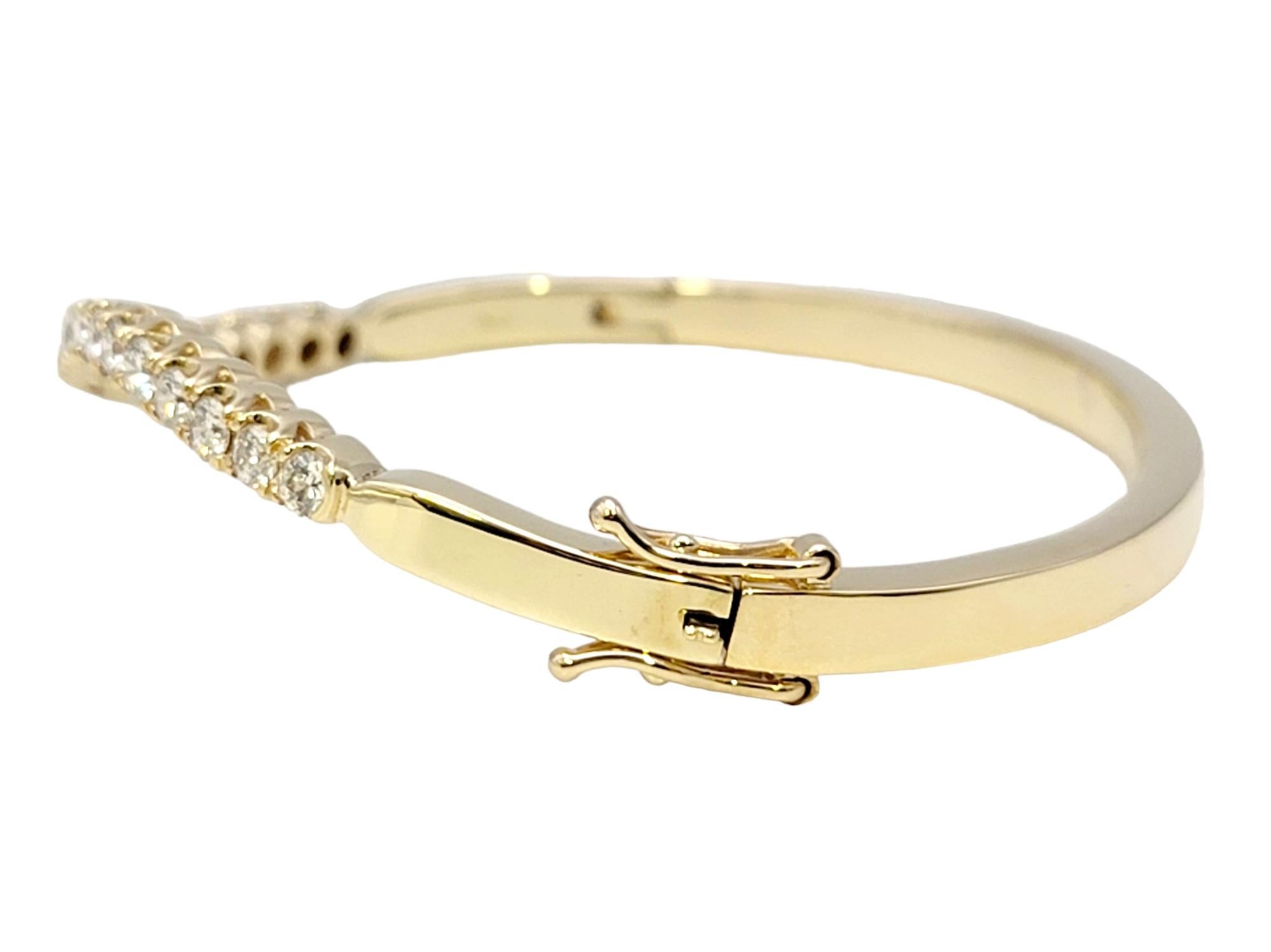 Women's Round Diamond Wave Oval Hinged Bangle Bracelet in 14 Karat Yellow Gold For Sale