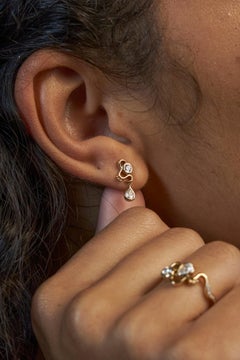 Borchie a onda con diamante rotondo Jevela Gigi