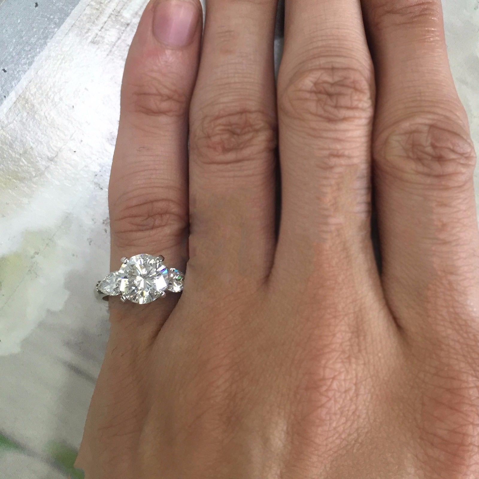 Ring May be made to order from scratch to accommodate your exact finger size 
or a different stone if the budget requires it, takes approximately 2-6 business Weeks
Setting with no center stone can be purchased also.

Center Stone Diamond Details :