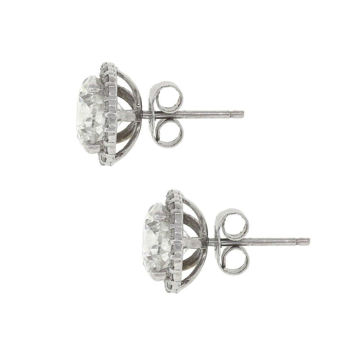 Material: 14k white gold
Diamond Details: Approximately 3.20ctw of round brilliant diamonds. Diamonds are G/H in color and SI in clarity.
Halo Diamond Details: Approximately 0.25ctw of round brilliant diamonds. Diamonds are G/H in color and SI in
