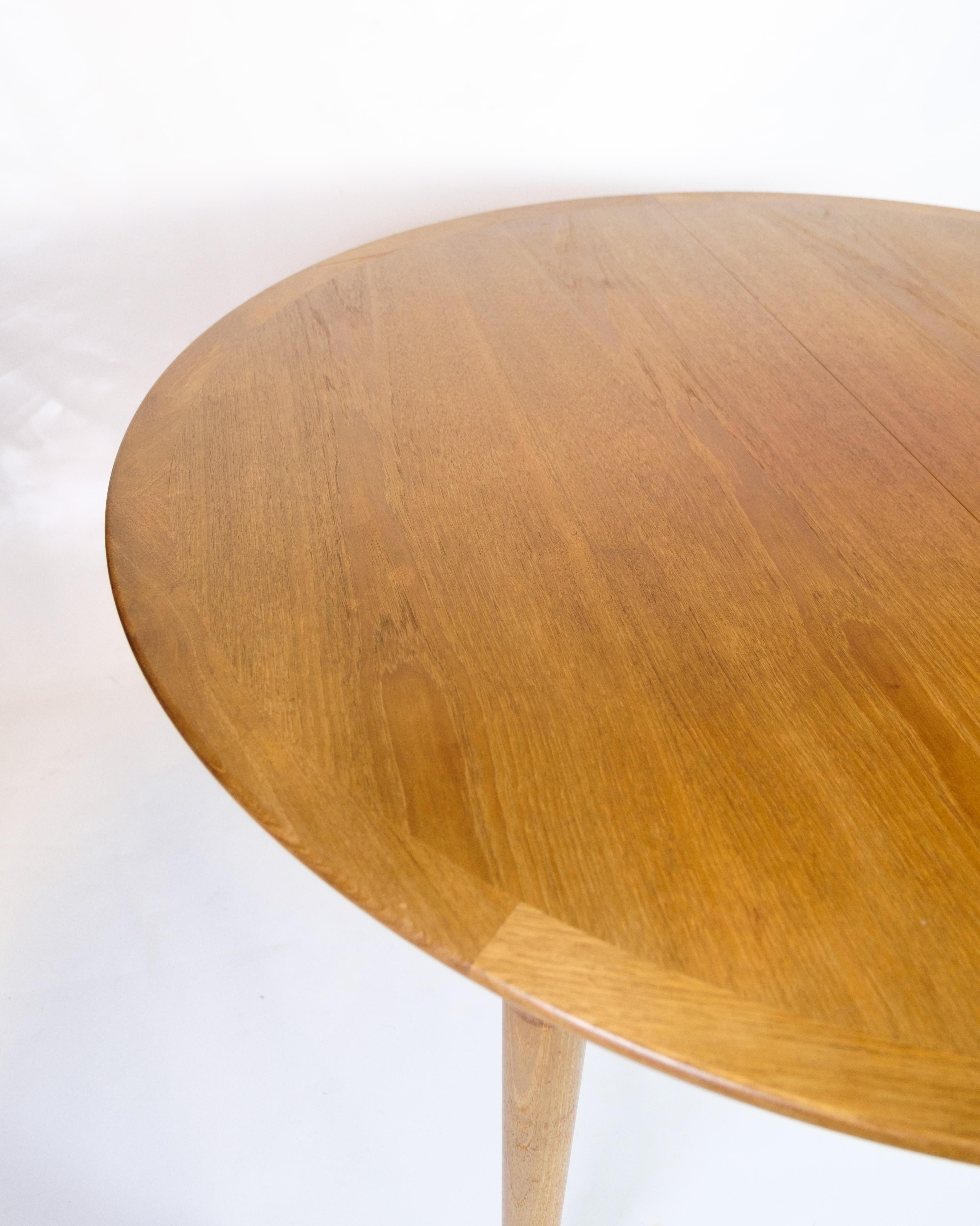 Mid-Century Modern Round Dining In Teak With Extension Leaves By Grete Jalk For P. Jeppesen For Sale