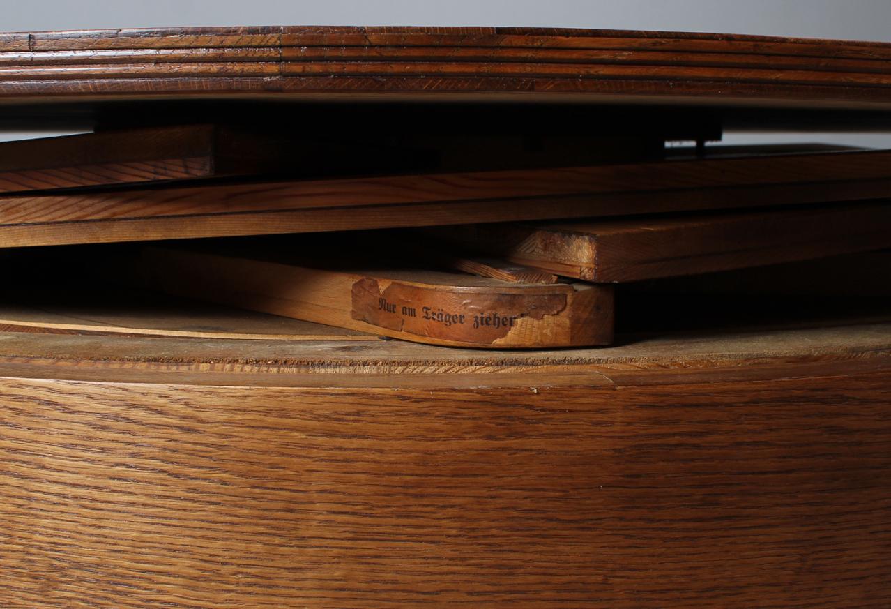 Round Dining Room Table with Special Enlarging Mechanism, Oak, 1920s 2