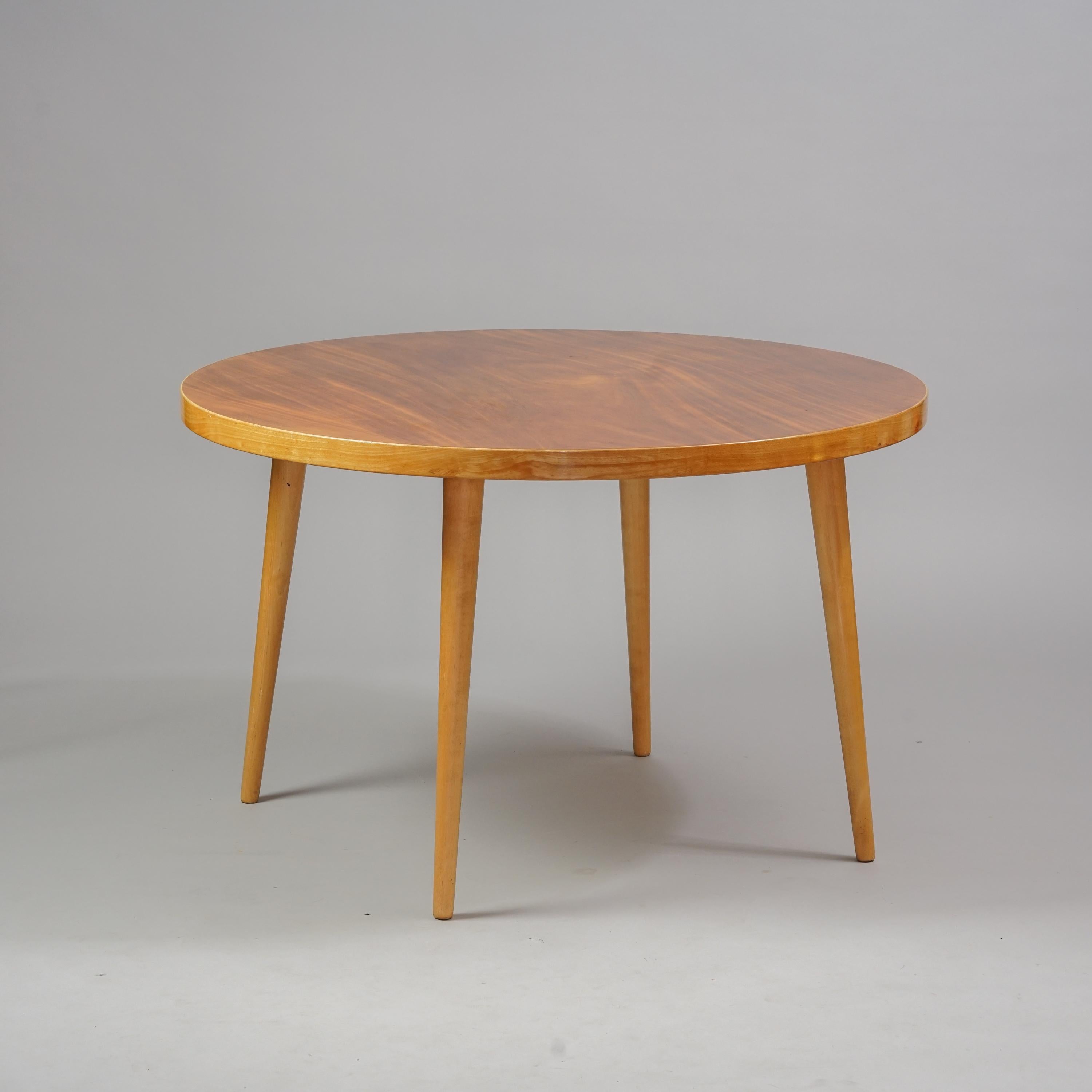 Round dining table by lImari Tapiovaara from the 1940s / 1950s. Birch frame. Good vintage condition, minor wear consistent with age and use. Possibly designed for Domus Academica. Classic Ilmari Tapiovaara design.