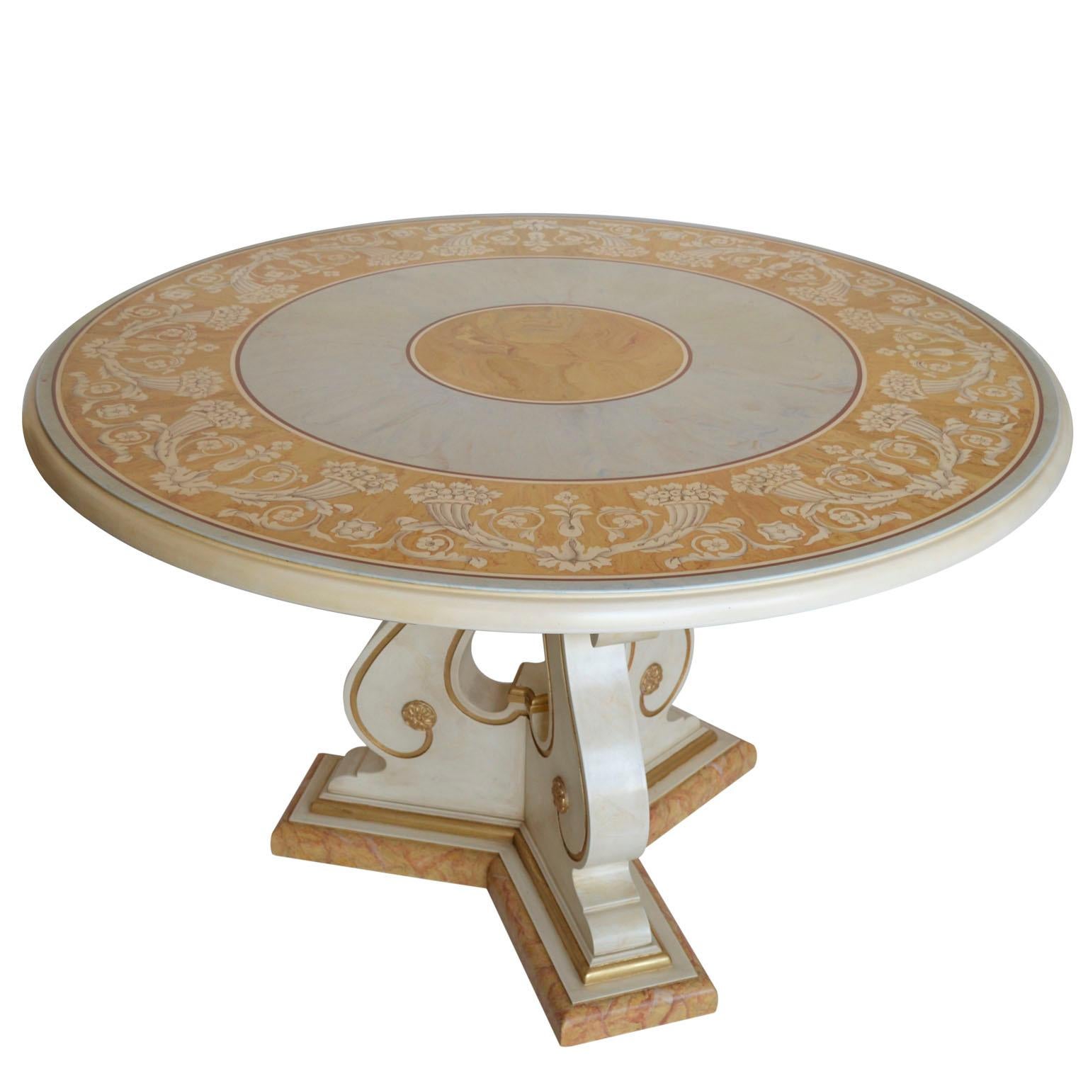 Verbena round dining or center table
This table with scagliola art inlay takes inspiration from the classical paliotto with a frame of cornucopias but the choice of colors, Siena yellow and light blue give a sophisticated effect to this romantic