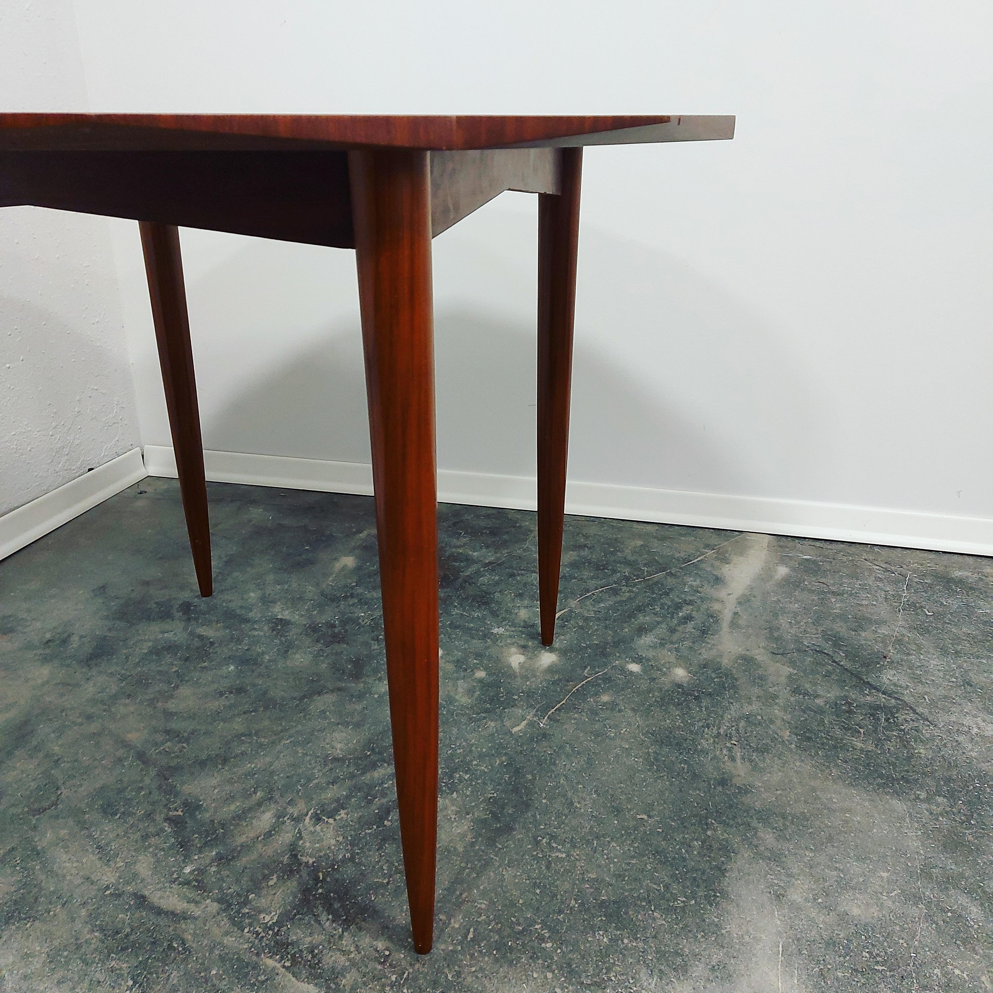 Very nice dining table in Scandinavian style.

The edges of the table are processed into different surfaces (shapes of gemstone) and represent the central piece.

The legs of the table are designed and made to act as if the table is floating, but it