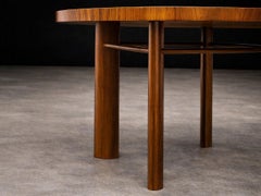 Round Dining Table in Caviúna Wood by Joaquim Tenreiro, Brazil, 1950s