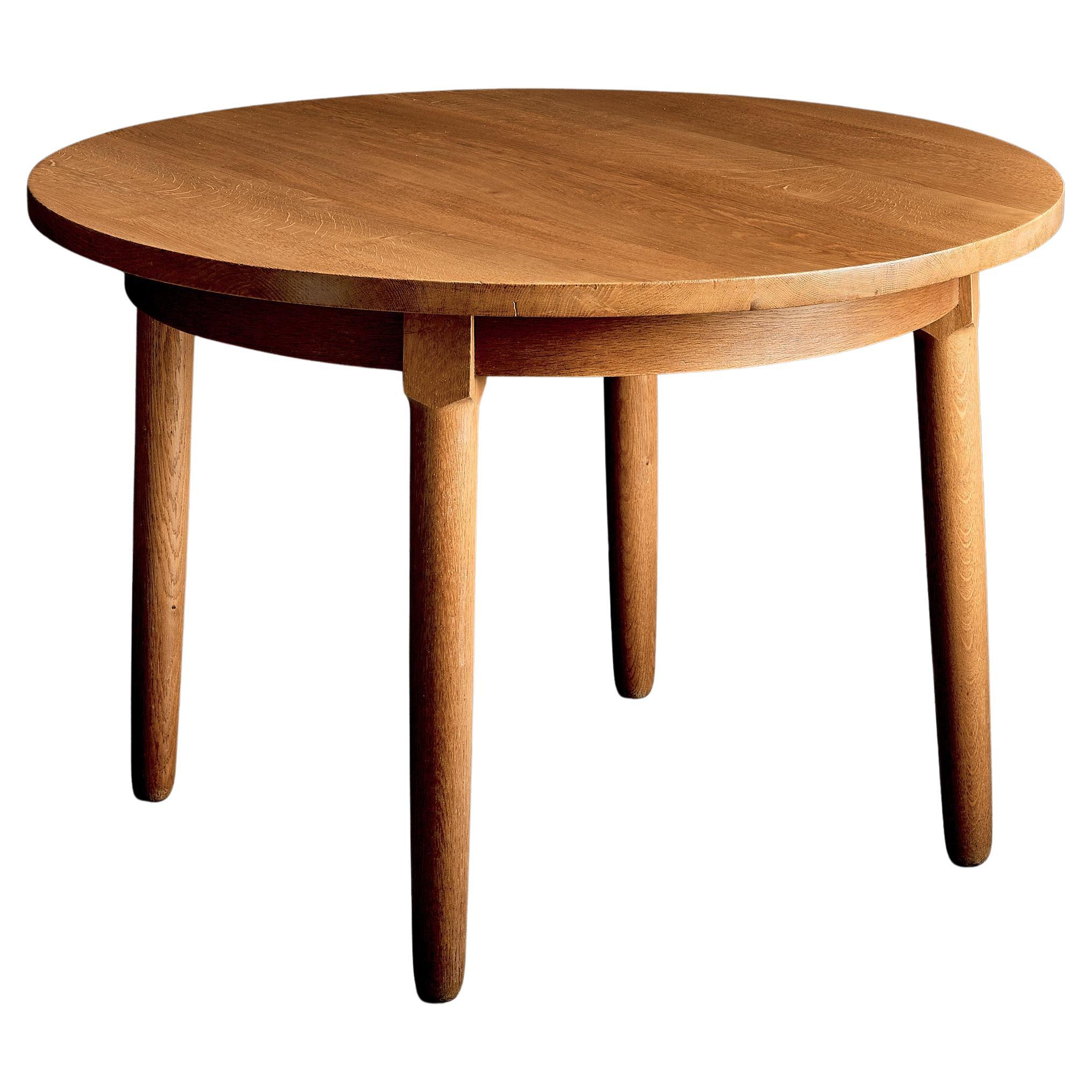Round Dining Table in Solid Oak in the manner of Hans Wegner, Denmark 1960s