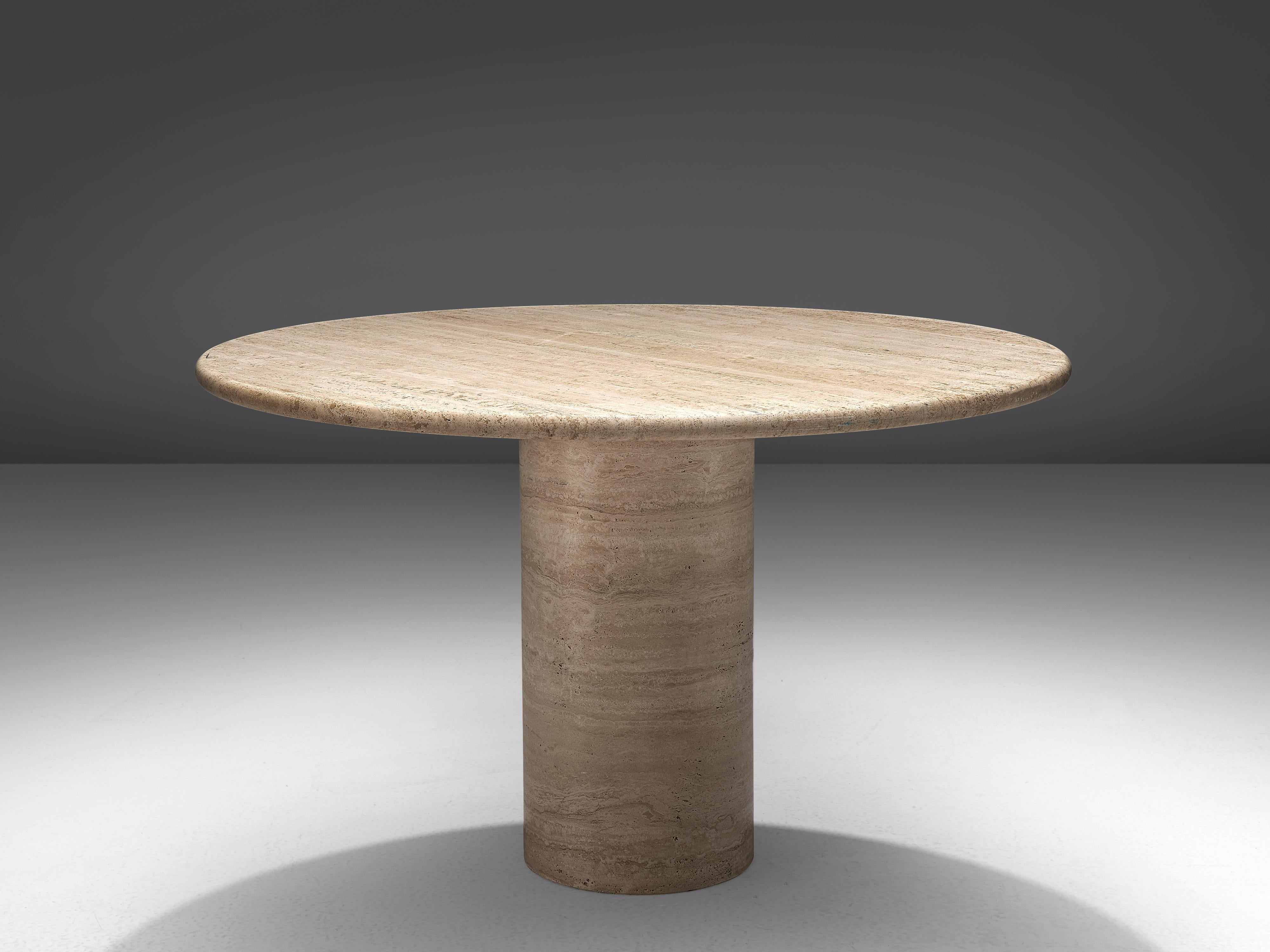 Dining table, travertine, Europe, 1970s

This solid dining table features a colon, cylindrically shaped foot and a thick circular travertine tabletop. The aesthetics are archetypical for postmodern design, bearing references to architectural forms