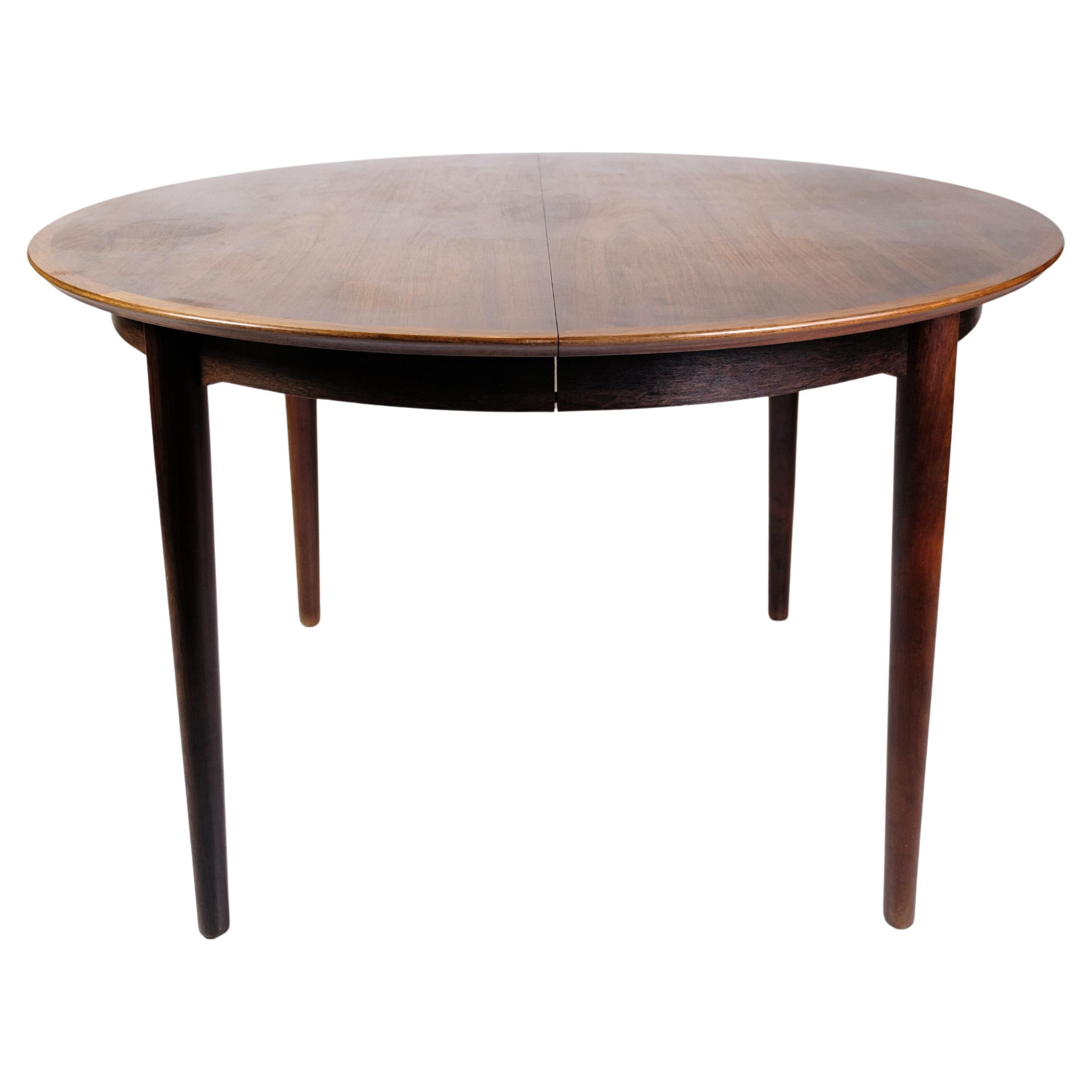 Table de salle à manger ronde fabriquée en bois de rose par Arne Vodder des années 1960