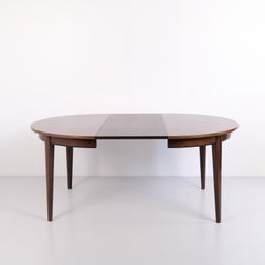 Round Dining Table Model 55 In Rosewood With Extension Leaves By Omann Jun