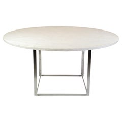 Tavolo da pranzo rotondo modello PK54 in marmo bianco laminato di Poul Kjærholm del 1963