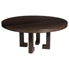 Bronze Leg and English Walnut Round Table. by Jonathan Field.