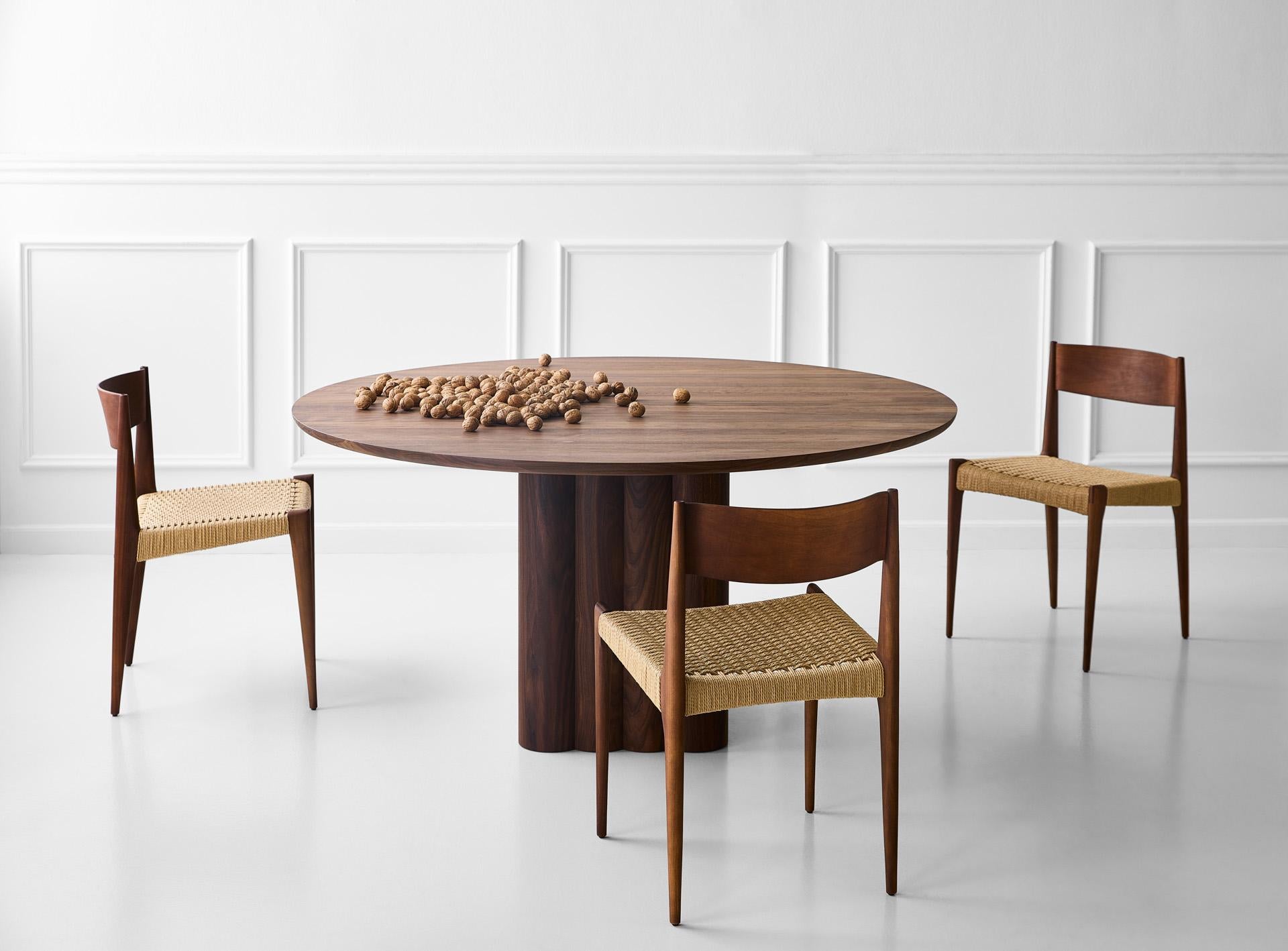 PLUSH dining table, round, 140 cm.
Solid wood table top and legs. Handmade in Denmark. 
Signed by Jacob Plejdrup for DK3

Table's height: 72 or 74 cm

Sold model: 
Smoked Oak
Cube base: 46x46 cm
Table top Thickness: 30 mm
(Extraction for max. 2