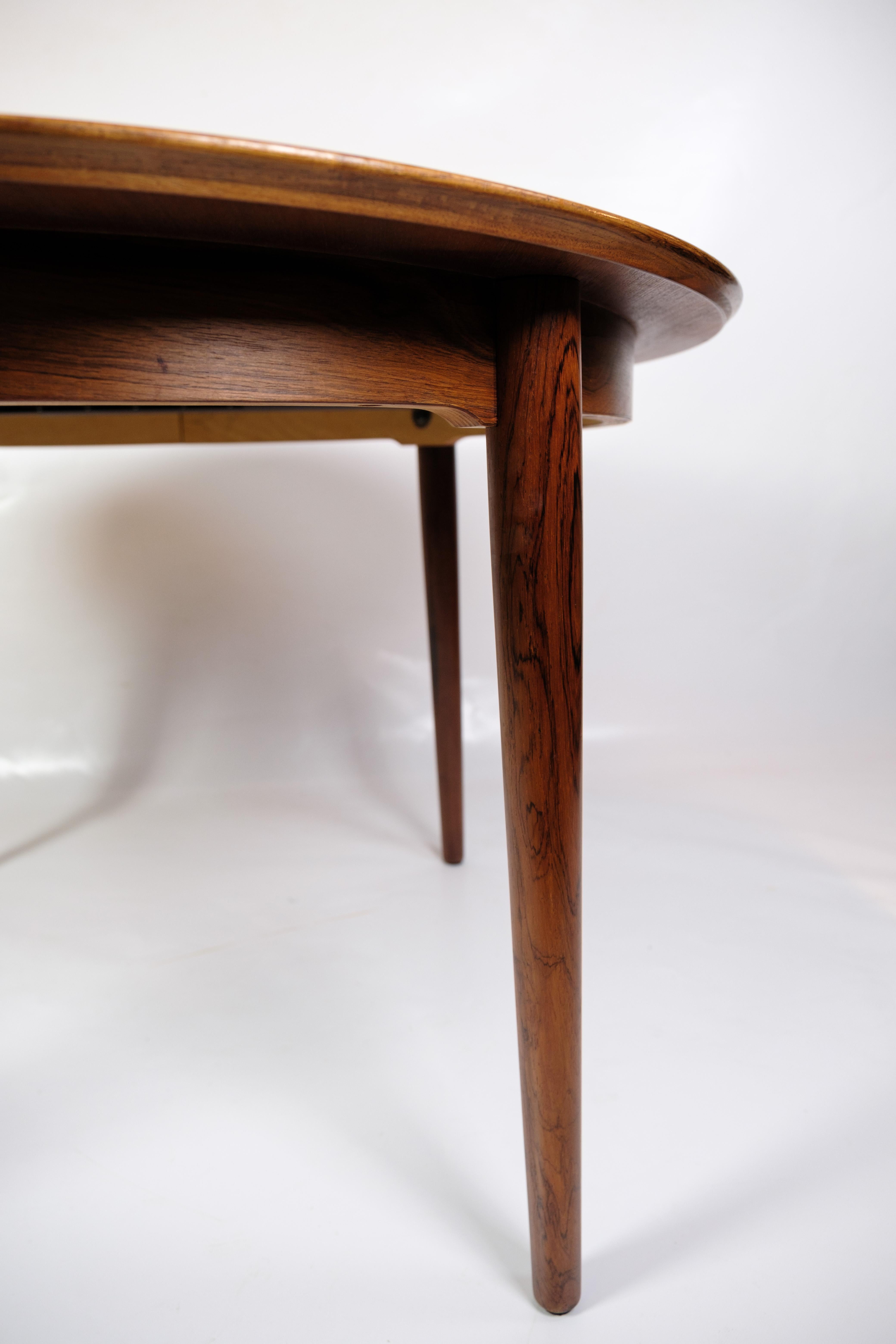Mid-Century Modern Round Dining Table  Made In rosewood By Arne Vodder From 1960s