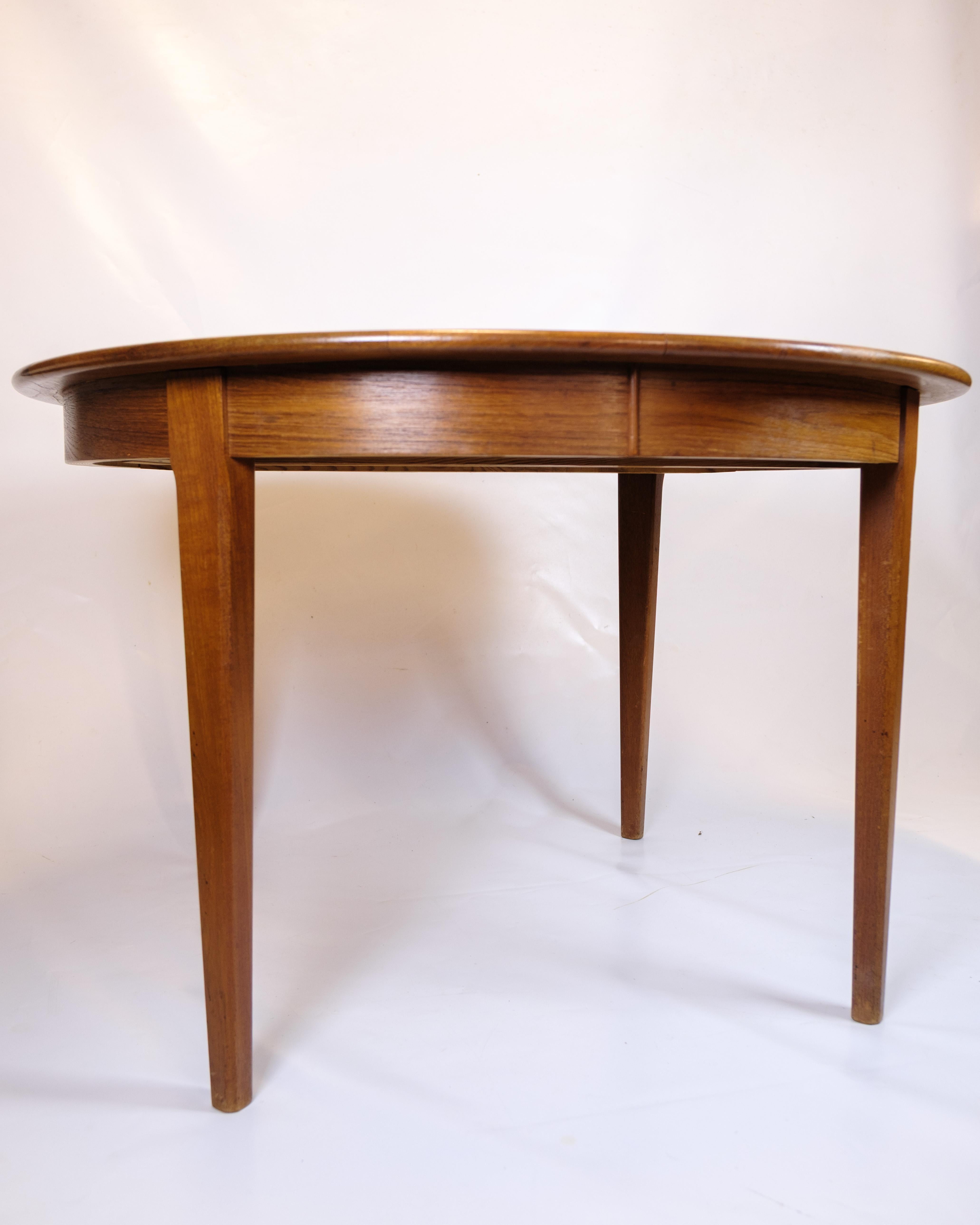Mid-Century moderno Tavolo da pranzo rotondo con foglie allungabili in teak degli anni '60 in vendita