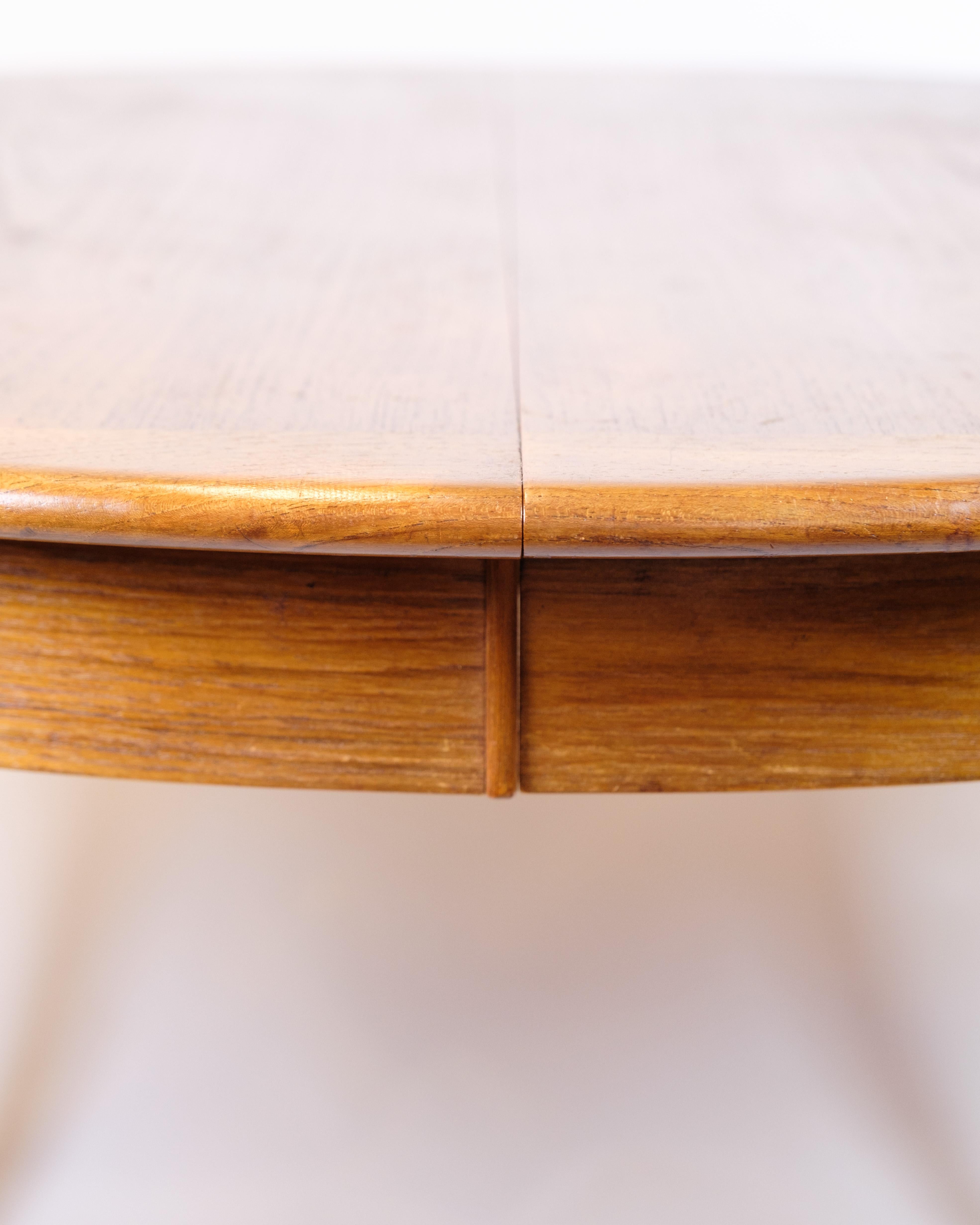 Teak Tavolo da pranzo rotondo con foglie allungabili in teak degli anni '60 in vendita