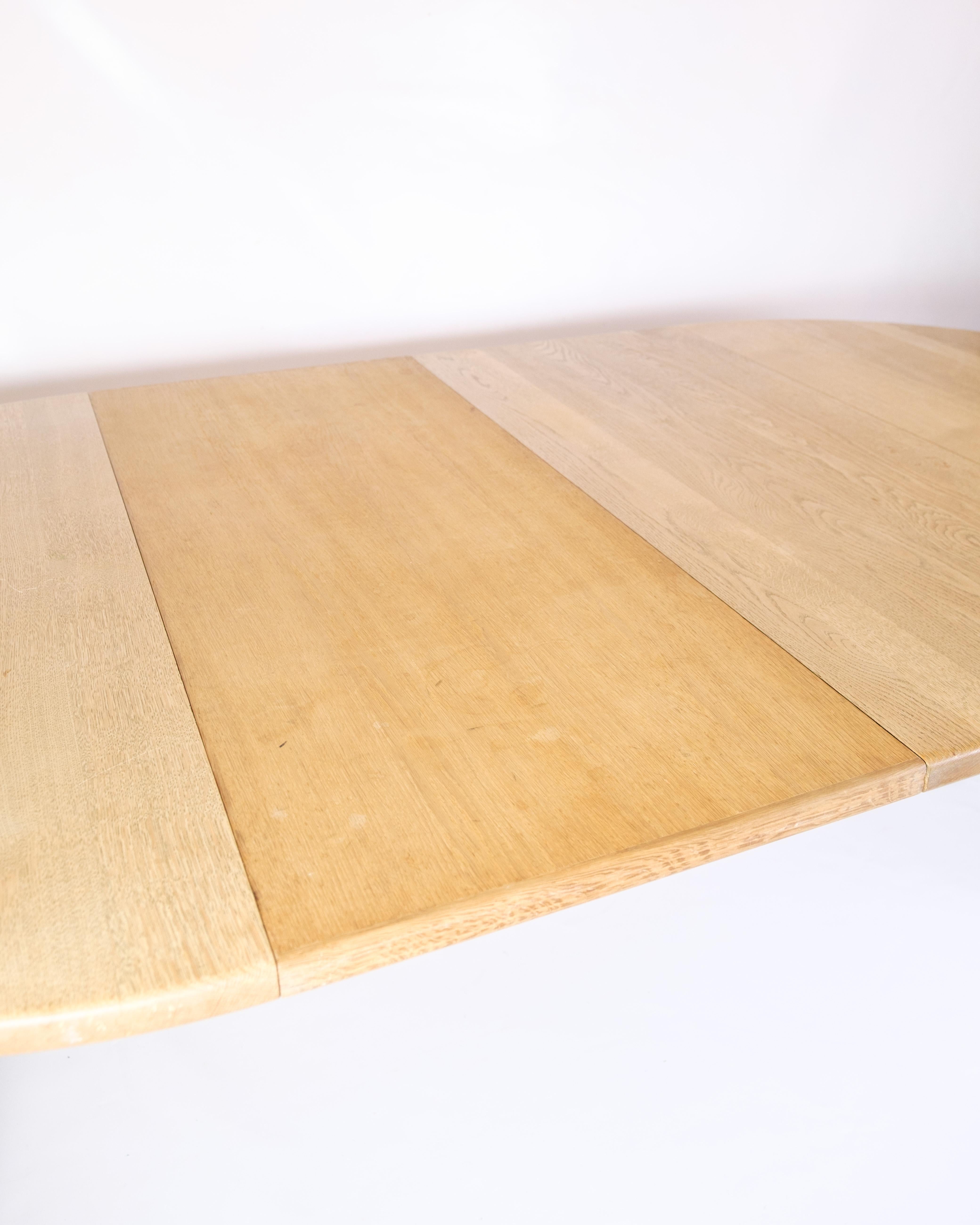 Danish Round Dining Table With Extension Made In Oak By Kurt Østervig For K.P Furniture For Sale