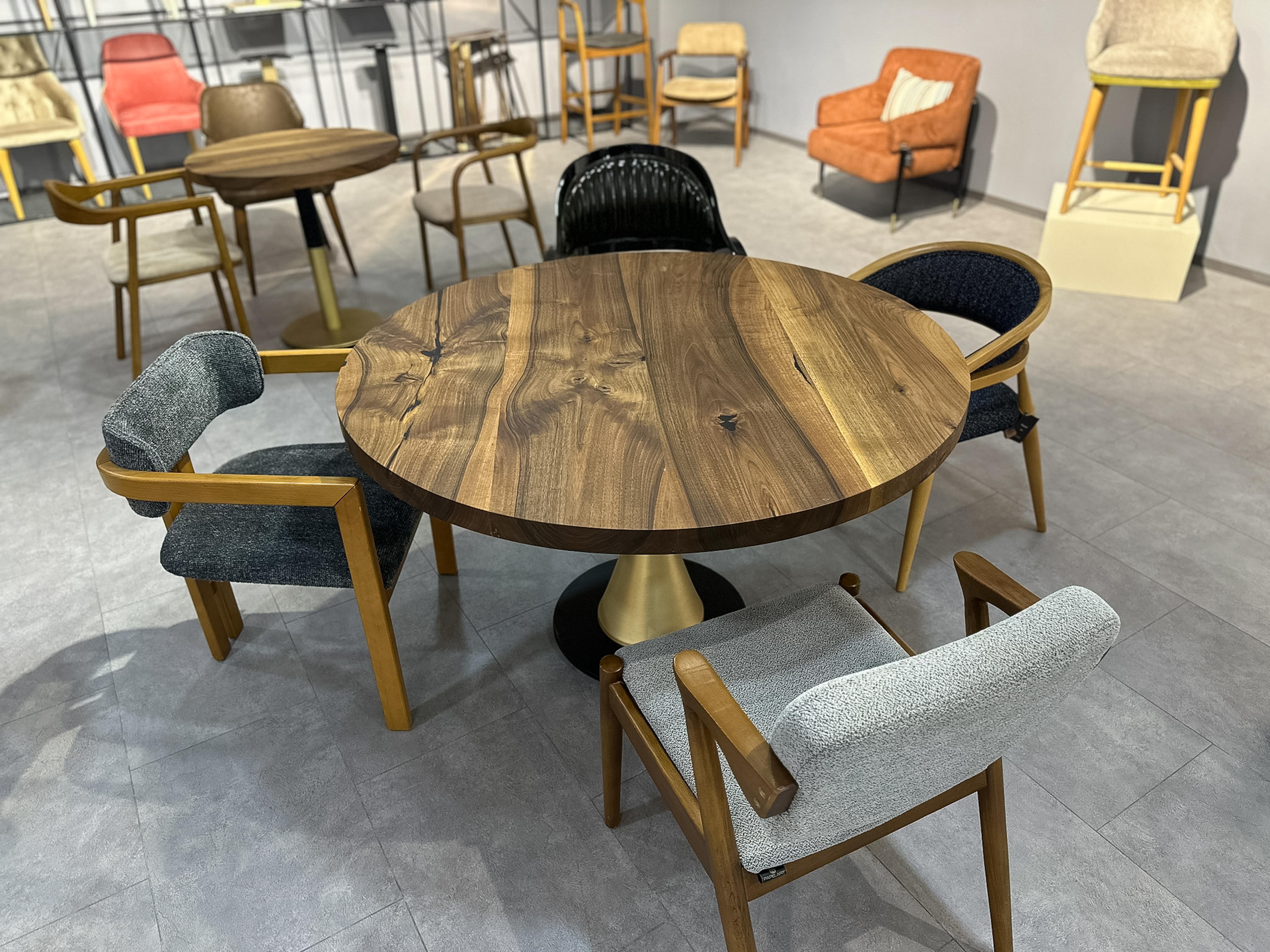 Natural Wood Round Dining Table

This wooden round table is made from high-quality Turkish walnut wood, known for its warm color and beautiful textures.

 You can use it as a dining table, a focal point in your living area, or a  conference room