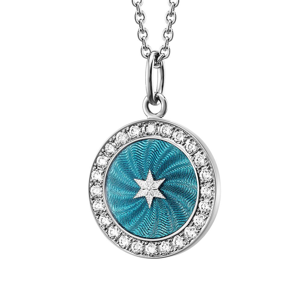 Victor Mayer round disc pendant with star 18k white gold, Diskos Collection, translucent turquoise vitreous enamel, 24 diamonds, total 0.36 ct, G VS, diameter app. 15.0 mm

About the creator Victor Mayer
Victor Mayer is internationally renowned for