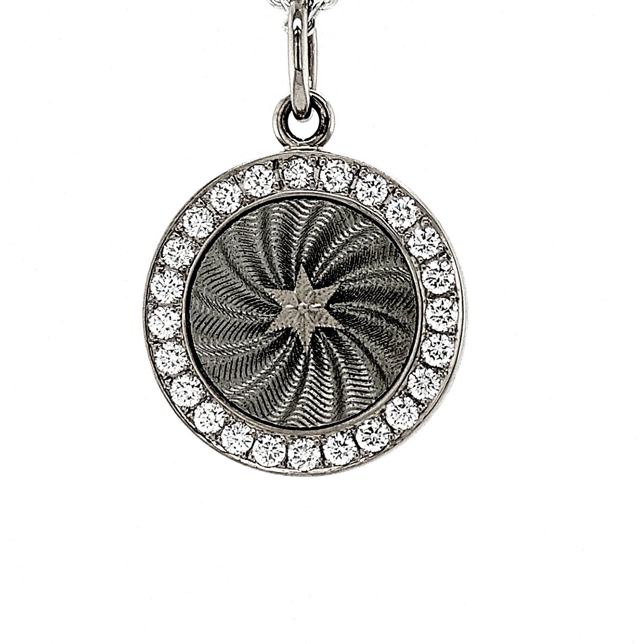 Victor Mayer round disc pendant necklace with star 18k white gold, Diskos Collection, translucent silver vitreous enamel, 24 diamonds, total 0.36 ct, G VS, diameter app. 15.0 mm

About the creator Victor Mayer
Victor Mayer is internationally