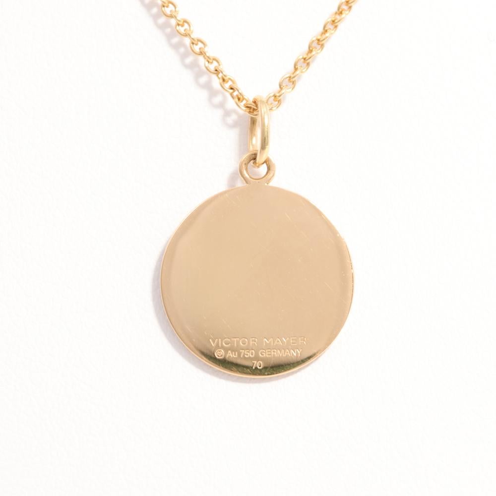 Round disk pendant necklace 18k yellow gold, Diskos Collection, translucent pink vitreous enamel, guilloche, gold paillons, diameter app. 15.0 mm 

About the creator Victor Mayer
Victor Mayer is internationally renowned for elegant timeless designs