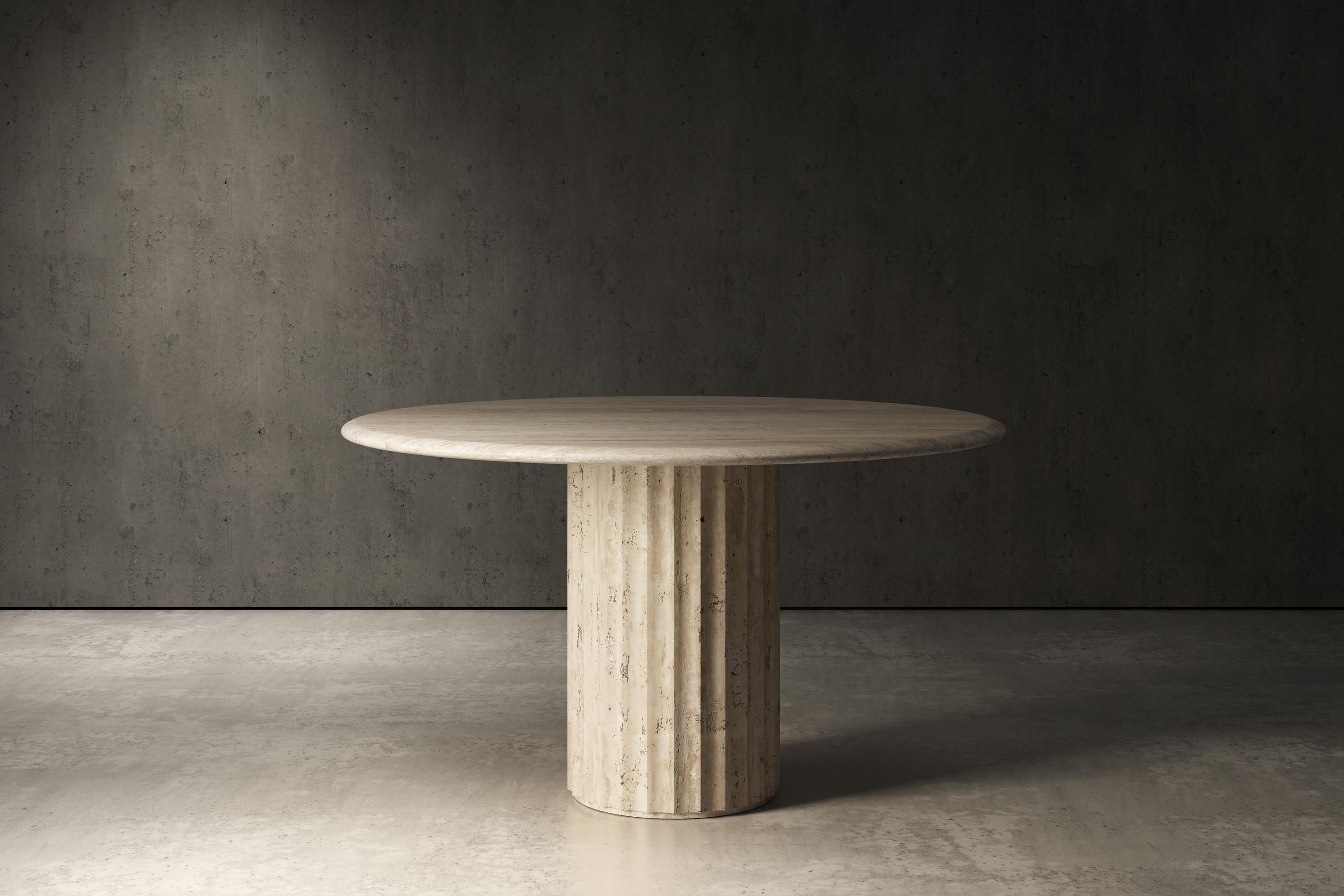 La table ronde Dorigo peut être personnalisée en différentes tailles et pierres.