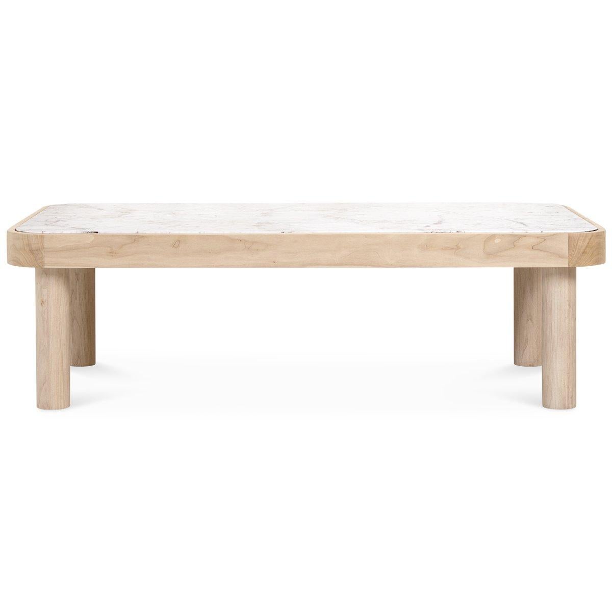 Smooth curves and natural materials are the highlights of this coffee table. Featuring a beautiful Carrara marble top bleached solid North American walnut legs and frame.
   